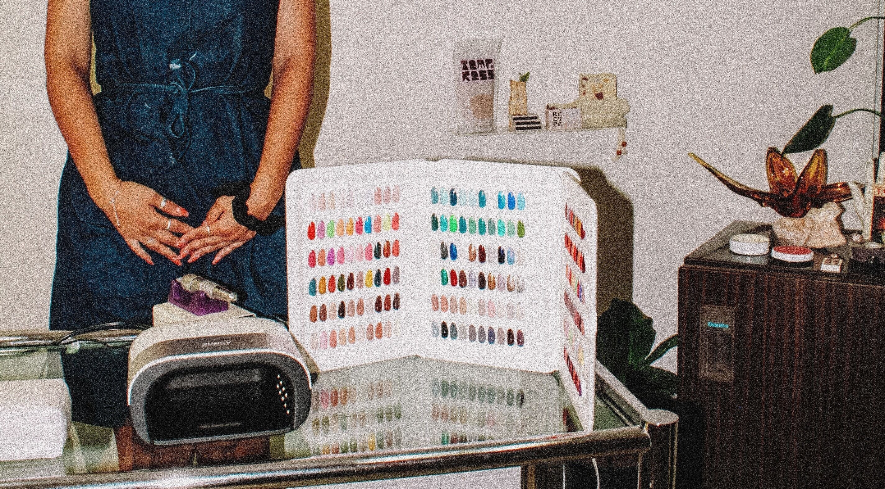 Nail polish color selection at Tempress Ongles, Montréal, Québec, CA, featuring a professional setup.