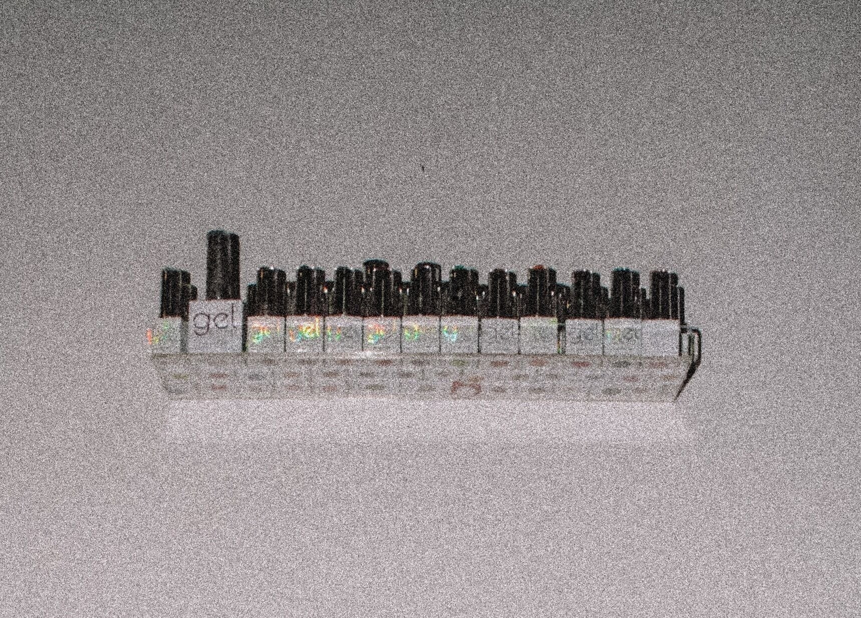 Variety of gel nail polishes displayed at Tempress Ongles, Montréal, Québec, CA.