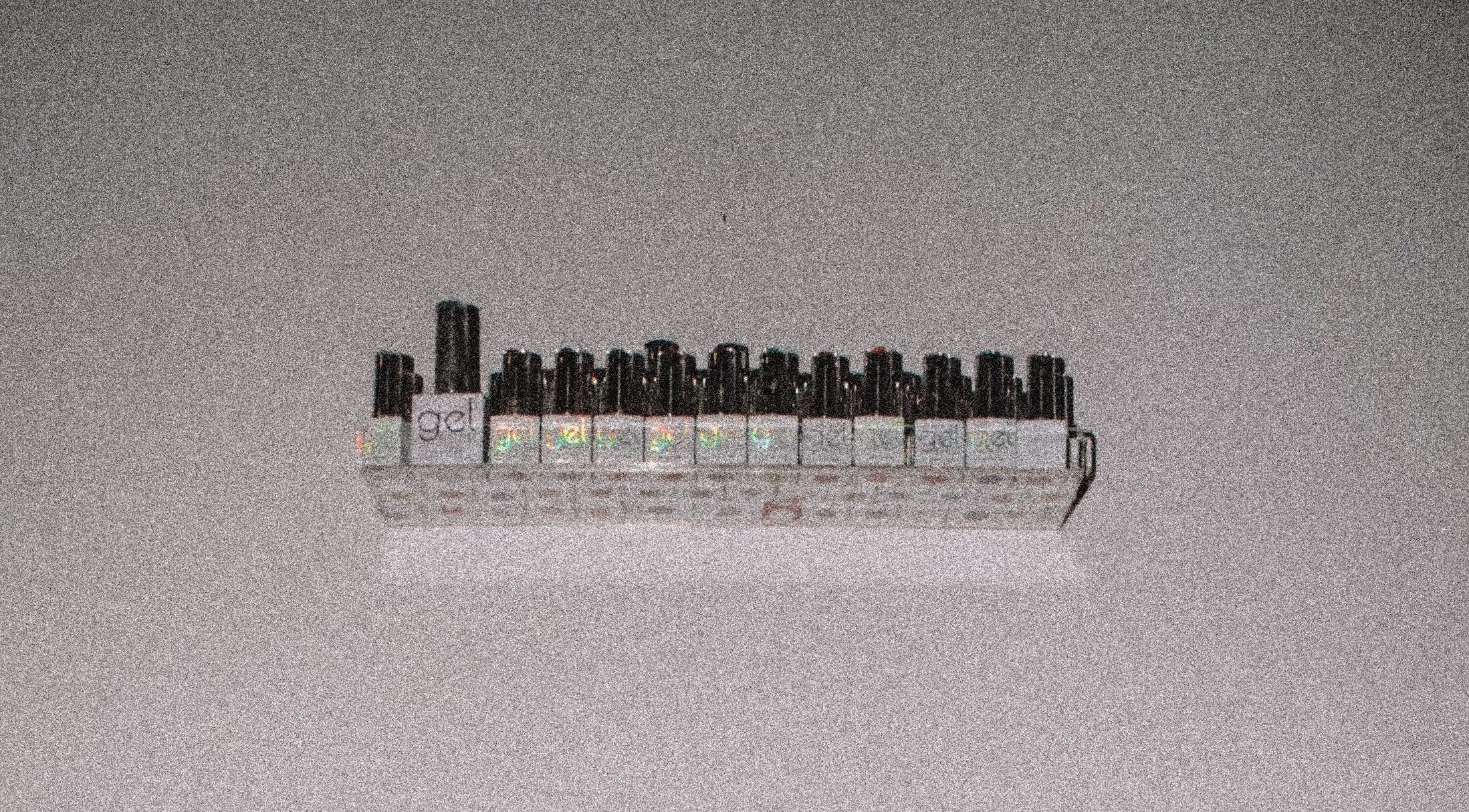 Variety of gel nail polishes displayed at Tempress Ongles, Montréal, Québec, CA.