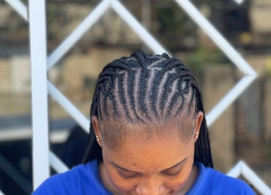 Intricate braided hairstyle by Braidsby Sue in Montego Bay, St. James Parish, JM.