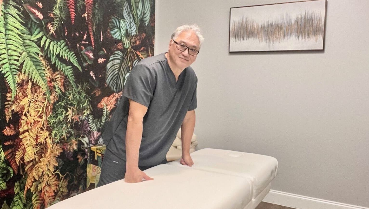 Massage therapist at THE REVIVE BAR in Allen, Texas, US ready to provide a relaxing experience.