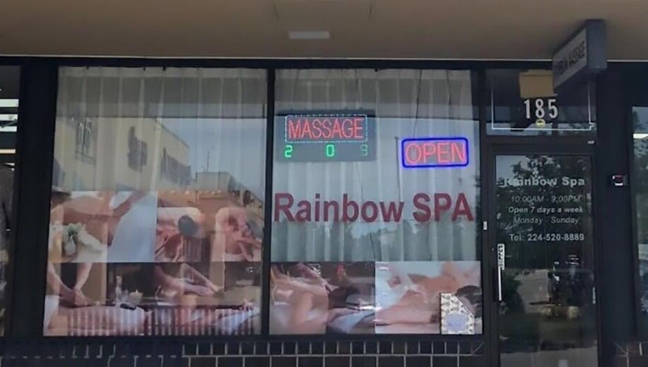 Exterior of Rainbow Spa in Schaumburg, Illinois, US with massage signage.