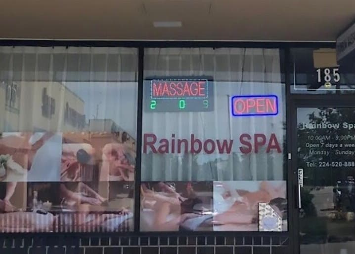 Exterior of Rainbow Spa in Schaumburg, Illinois, US with massage signage.