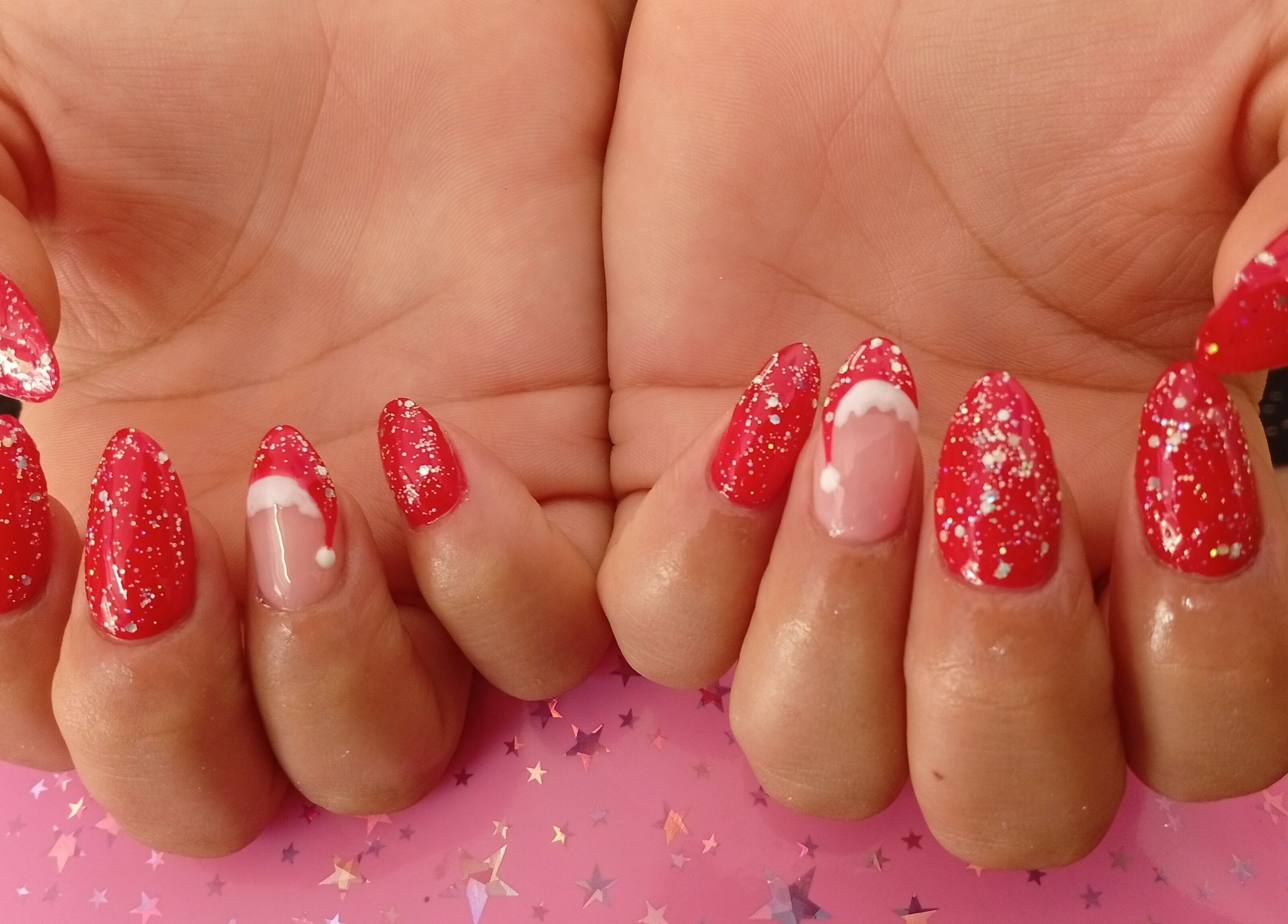 Sparkling red holiday nails at Vibras Nails, Rosario, Santa Fe, AR.