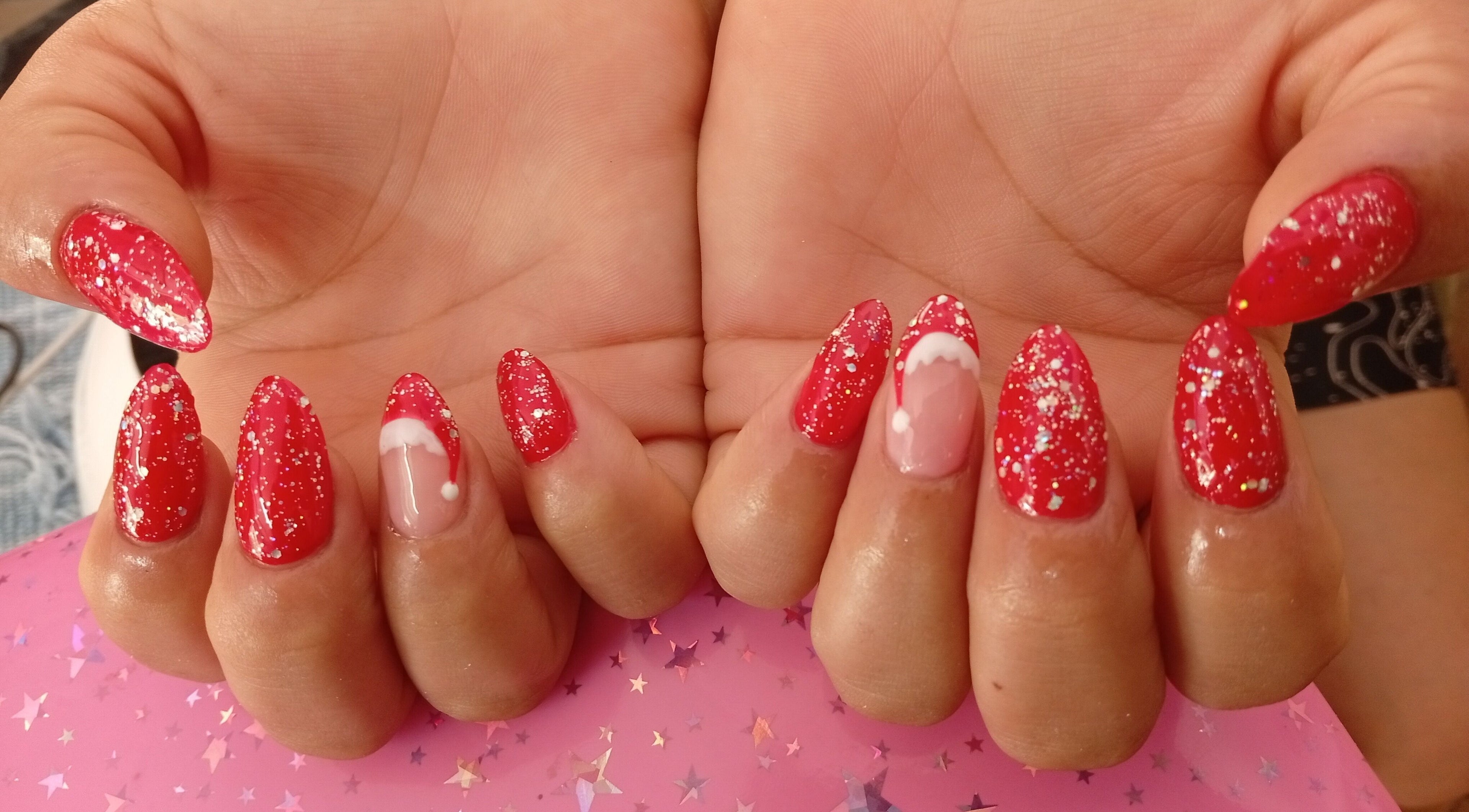 Sparkling red holiday nails at Vibras Nails, Rosario, Santa Fe, AR.