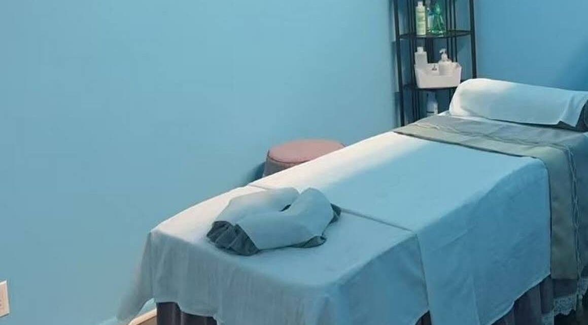 Relaxing massage room at XINGXING MASSAGE in Pomona, California, US, featuring a prepared massage table.