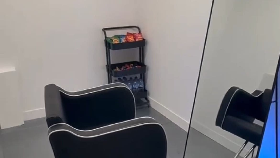 Chic salon corner at DreadsbyDy, London, England, GB, featuring a stylish chair and snack cart.