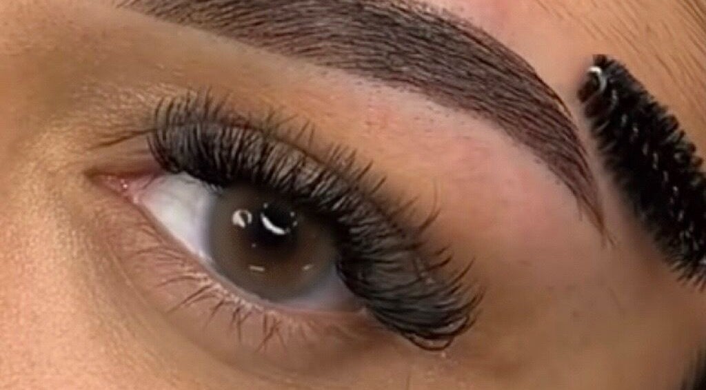 Close-up of a flawlessly groomed eyebrow and lashes at Lash and Brows by Suzet, Missouri City, Texas, US.