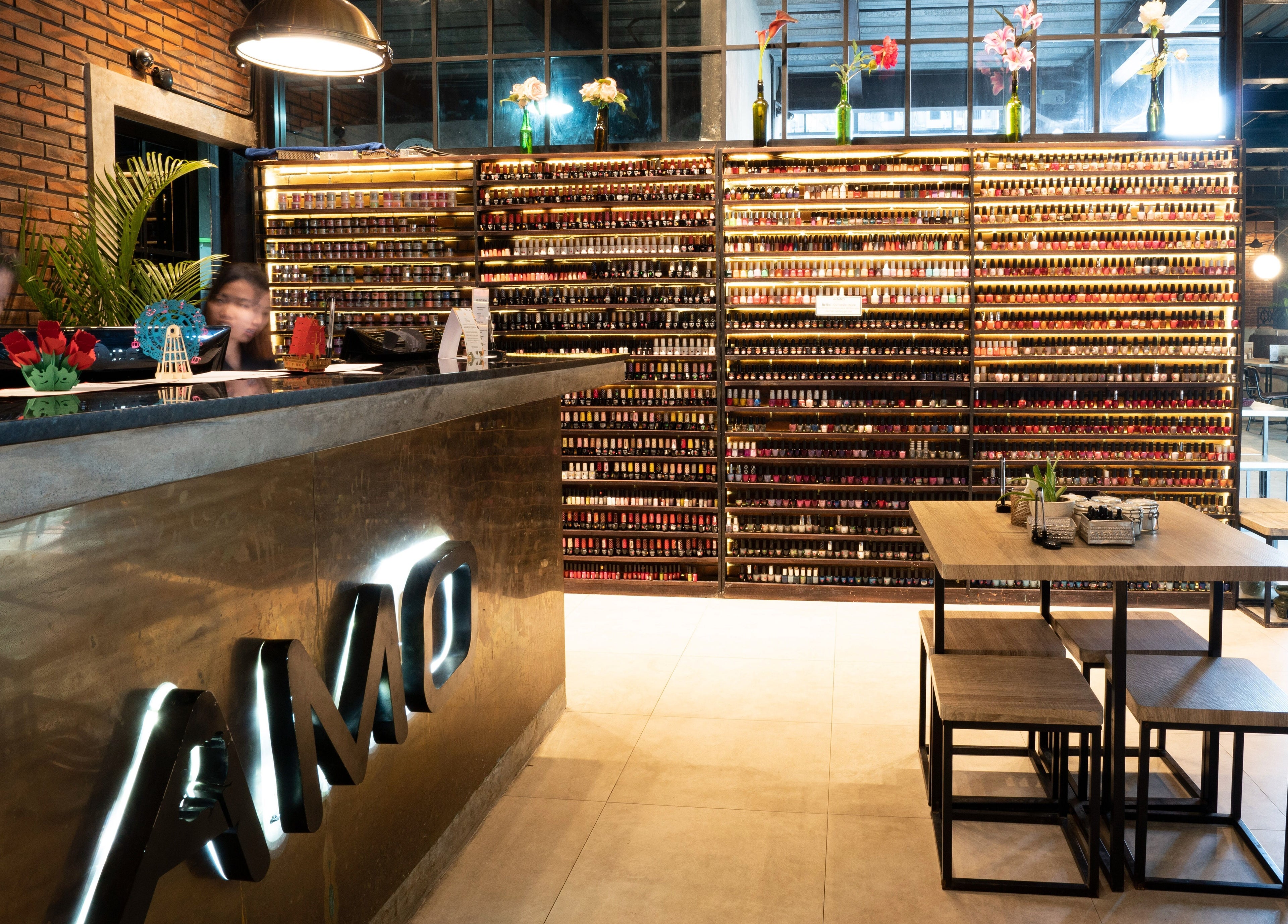 Reception and polish shelves at Amo Spa in Bali, Bali, ID showcasing a luxurious interior.