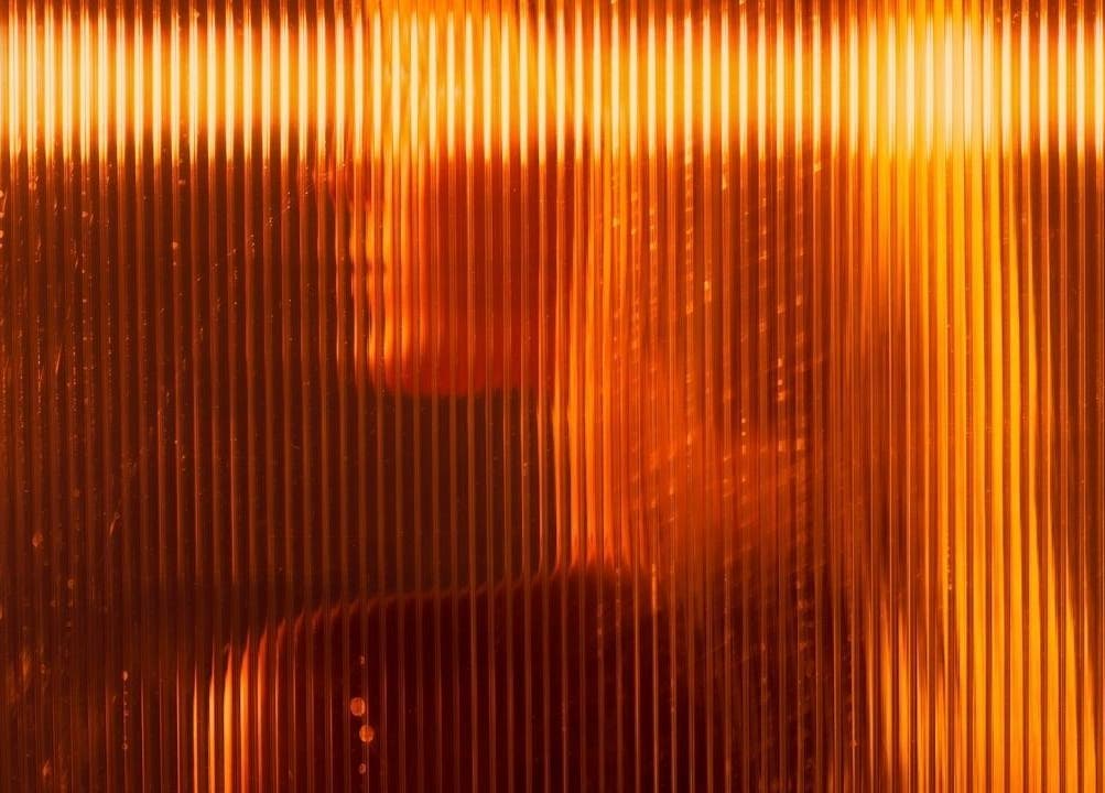 Artistic golden light at CRYBABY HAIRCLUB, Glasgow, Scotland, GB, creating a warm ambiance.