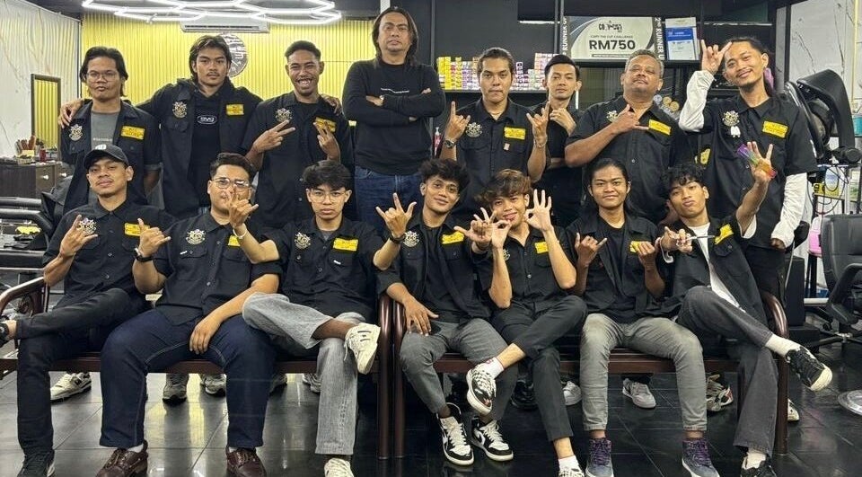 Team at MCo Barbershop Hq in Shah Alam, Selangor, MY, showcasing unity and style.