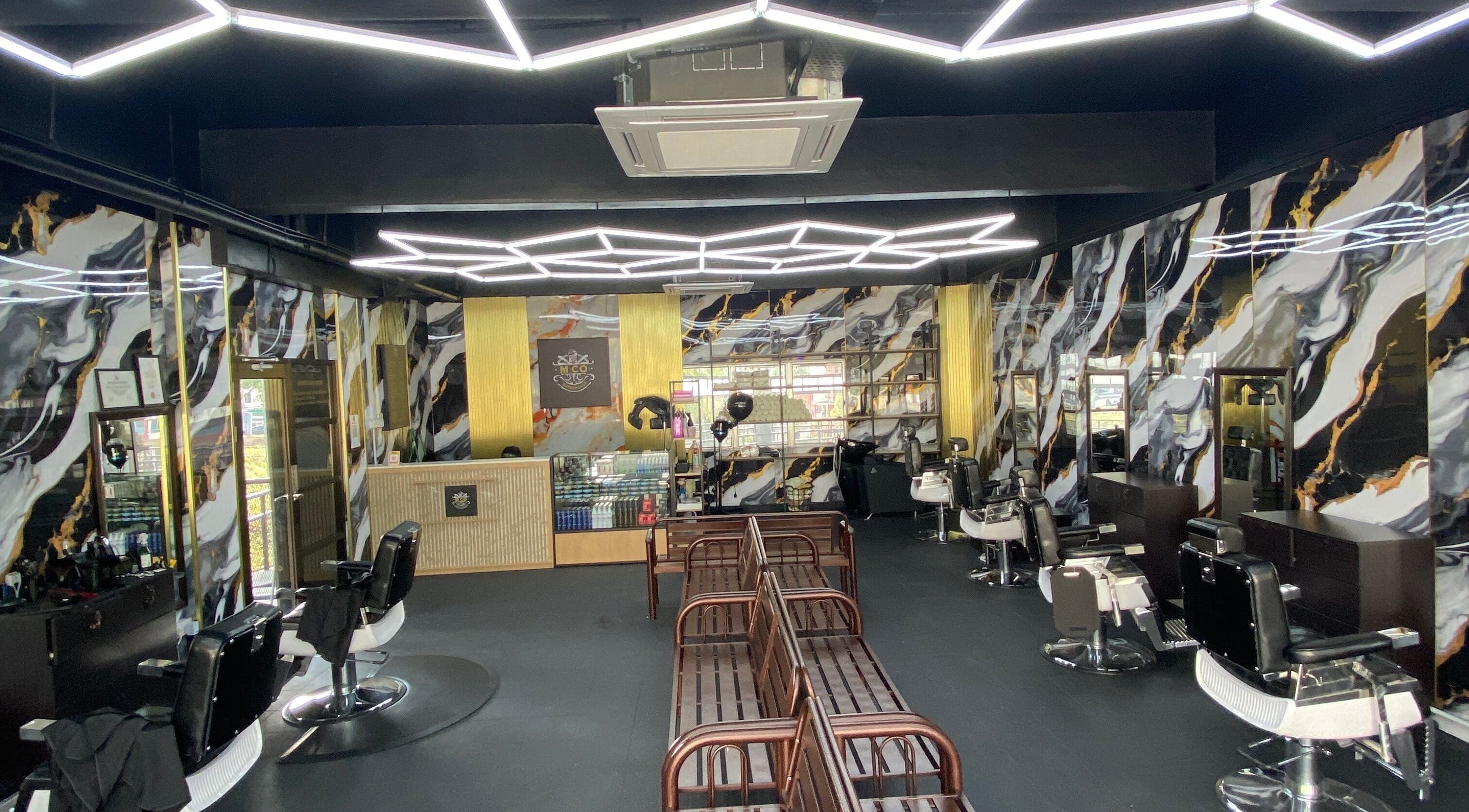 Chic interior of MCo Barbershop Hq in Shah Alam, Selangor, MY showcasing modern design and comfortable seating.