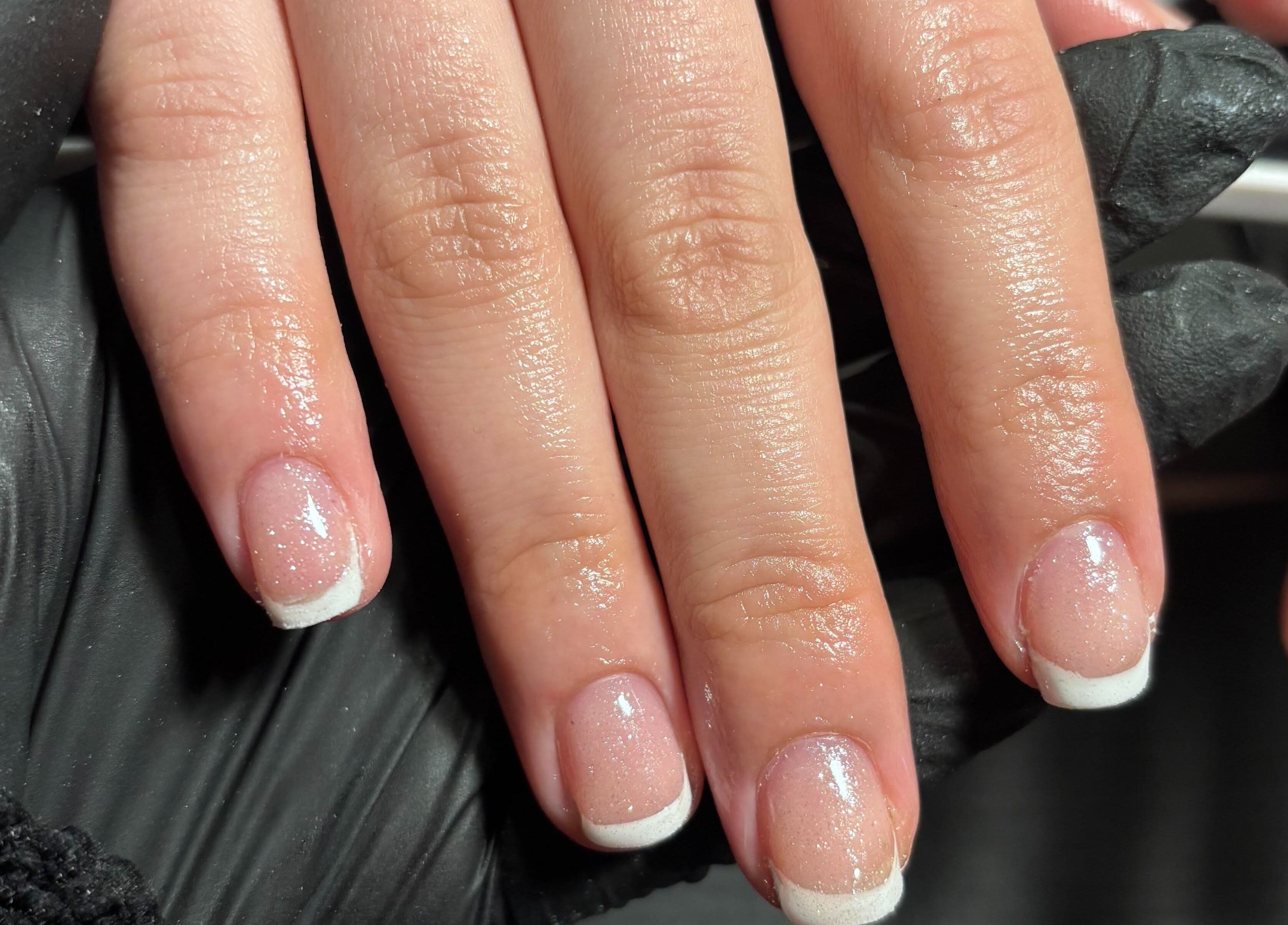 French manicure with a glossy finish at Black Cat Nails, Long Lawford, England, GB.