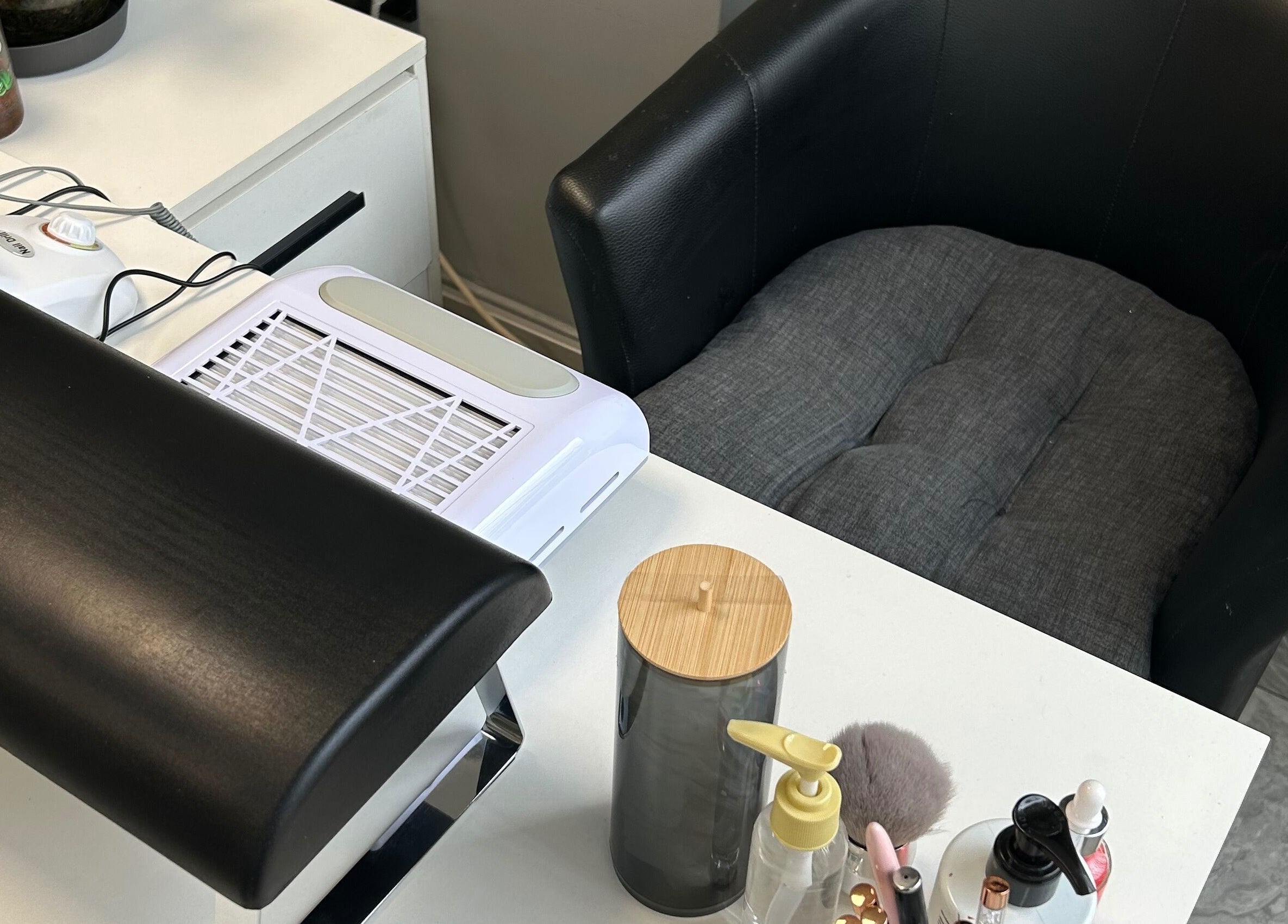 Relaxing manicure setup at Moni Style, Sofia, Sofia City Province, BG, with a plush chair and nail tools.