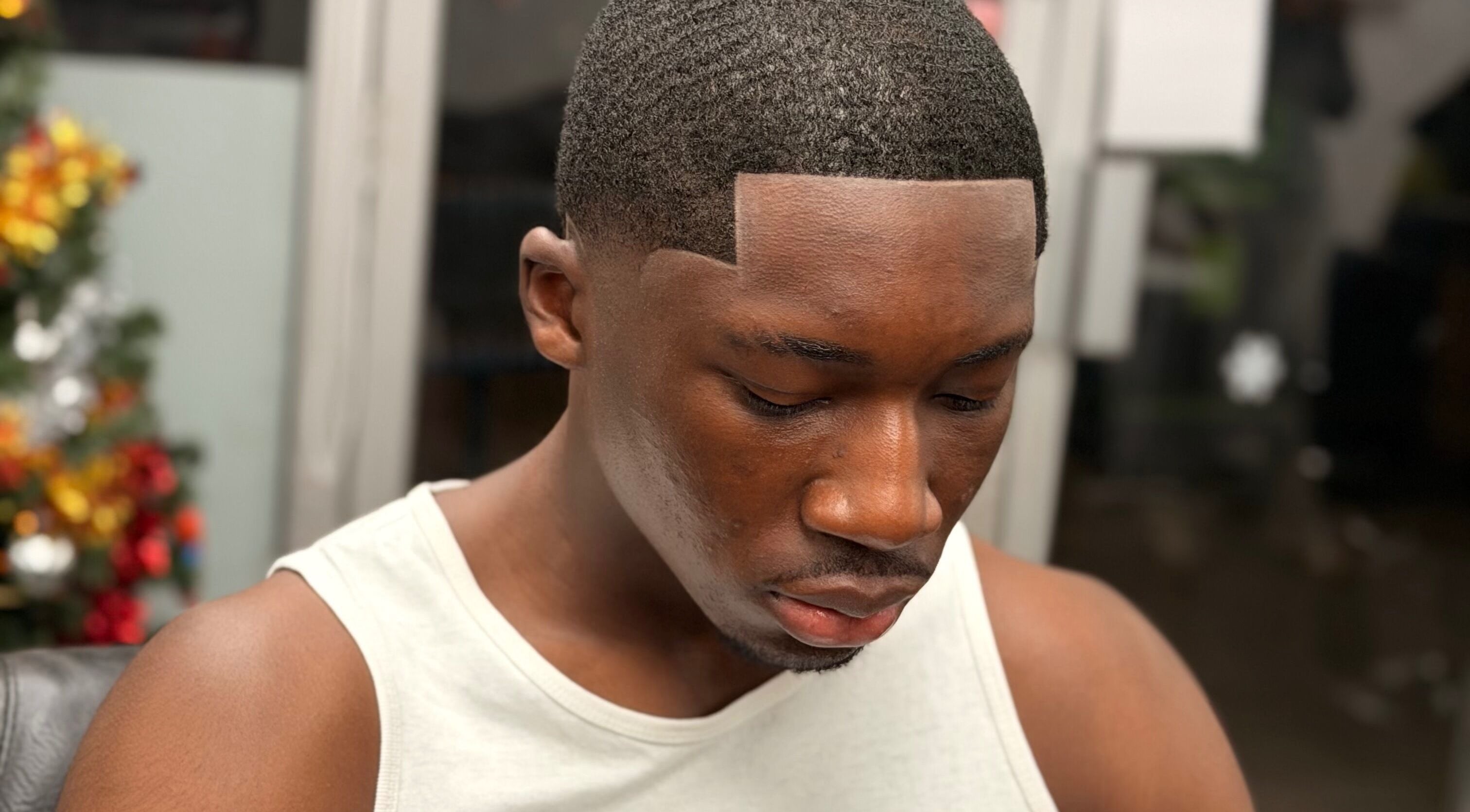 Close-up of a sharp haircut at Rammycutz, London, England, GB, showcasing expert barbering skills.