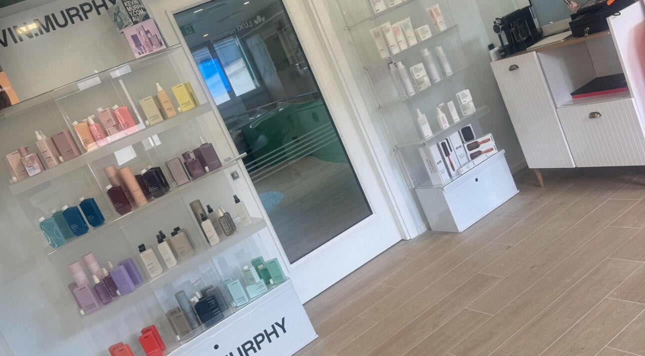 Luxi Hairdressing product shelves in Tas-sliema, MT featuring hair care essentials.