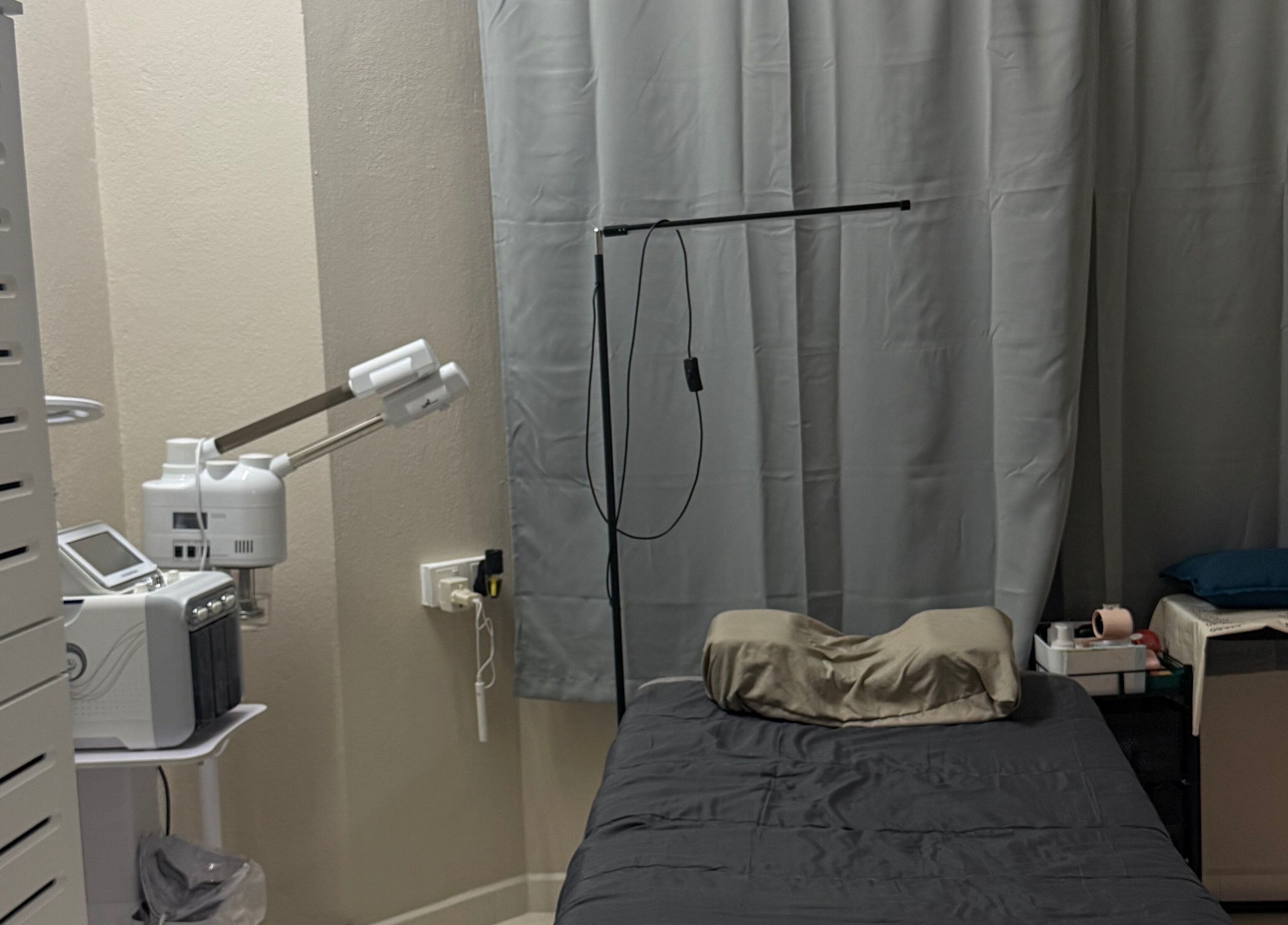 HSQ BEAUTY treatment room with equipment and bed in Balik Pulau, Pulau Pinang, MY.