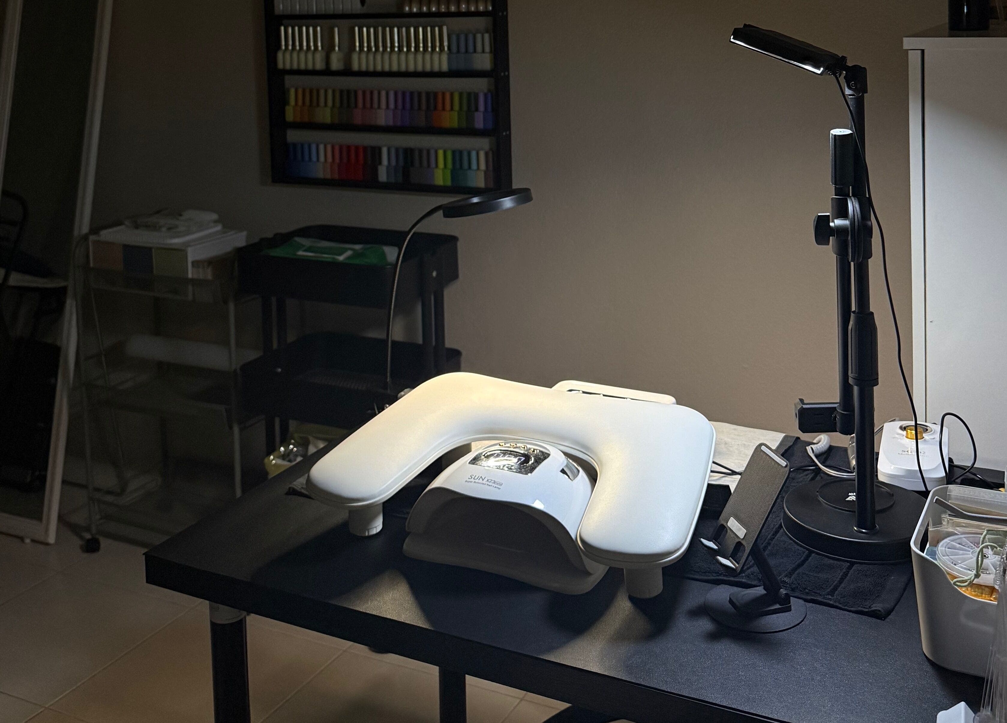 HSQ BEAUTY nail station setup at Balik Pulau, Pulau Pinang, MY, featuring modern equipment and ambient lighting.