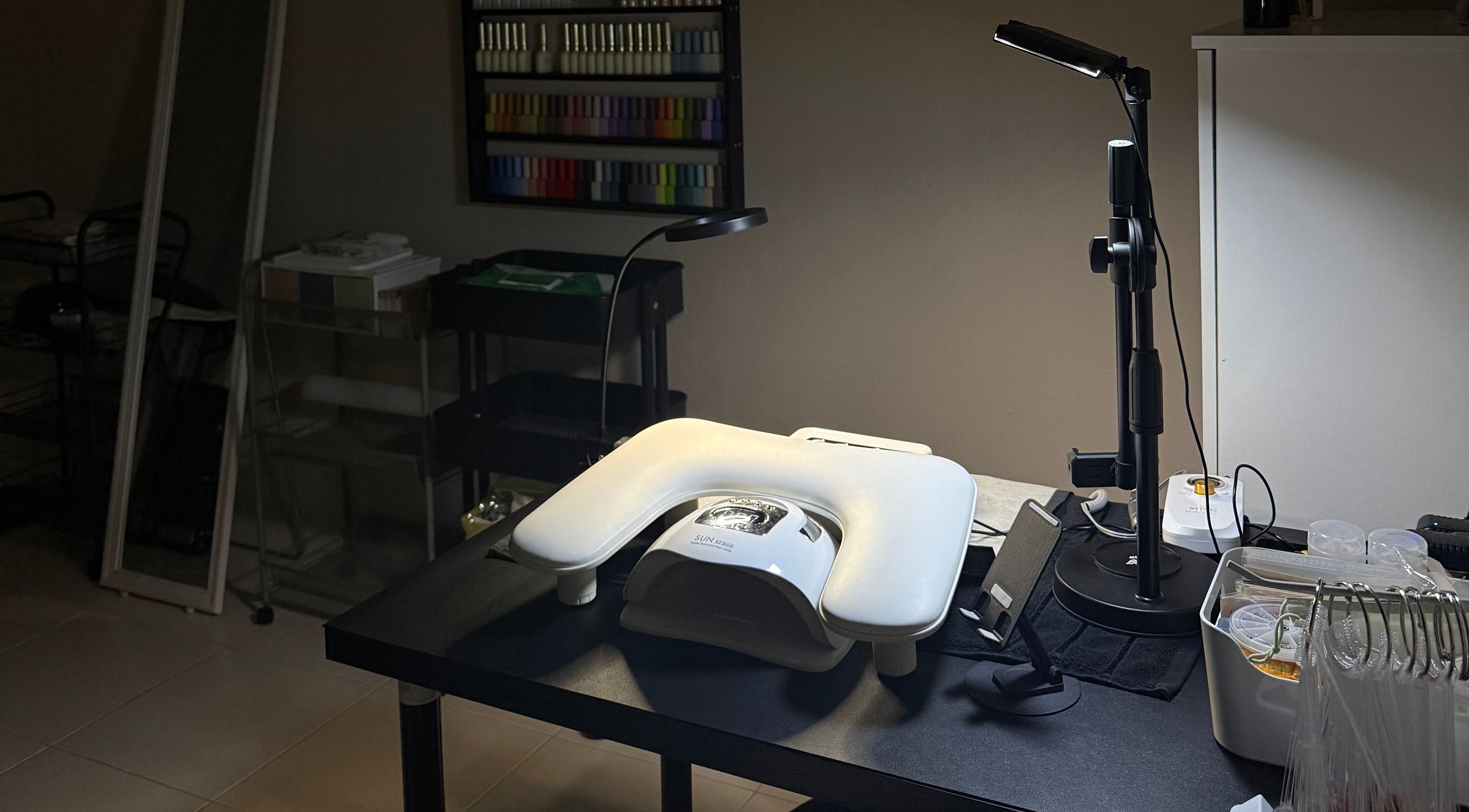 HSQ BEAUTY nail station setup at Balik Pulau, Pulau Pinang, MY, featuring modern equipment and ambient lighting.