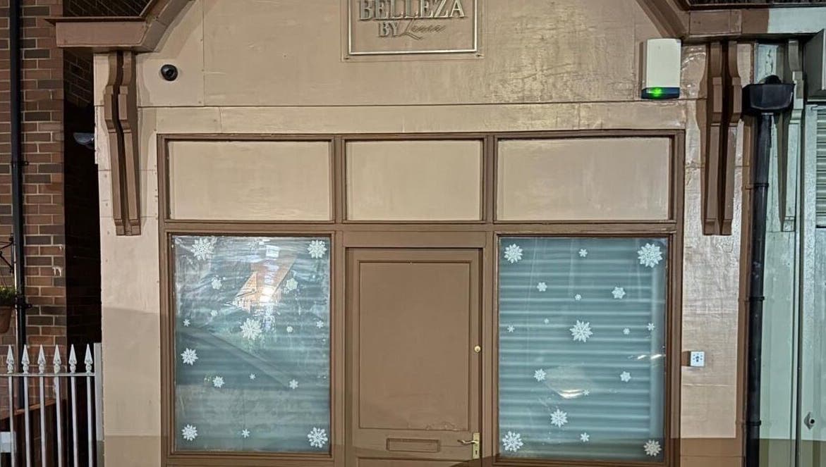 Front view of Megnificent.Nailsss in Gateshead, England, GB with festive window decor.