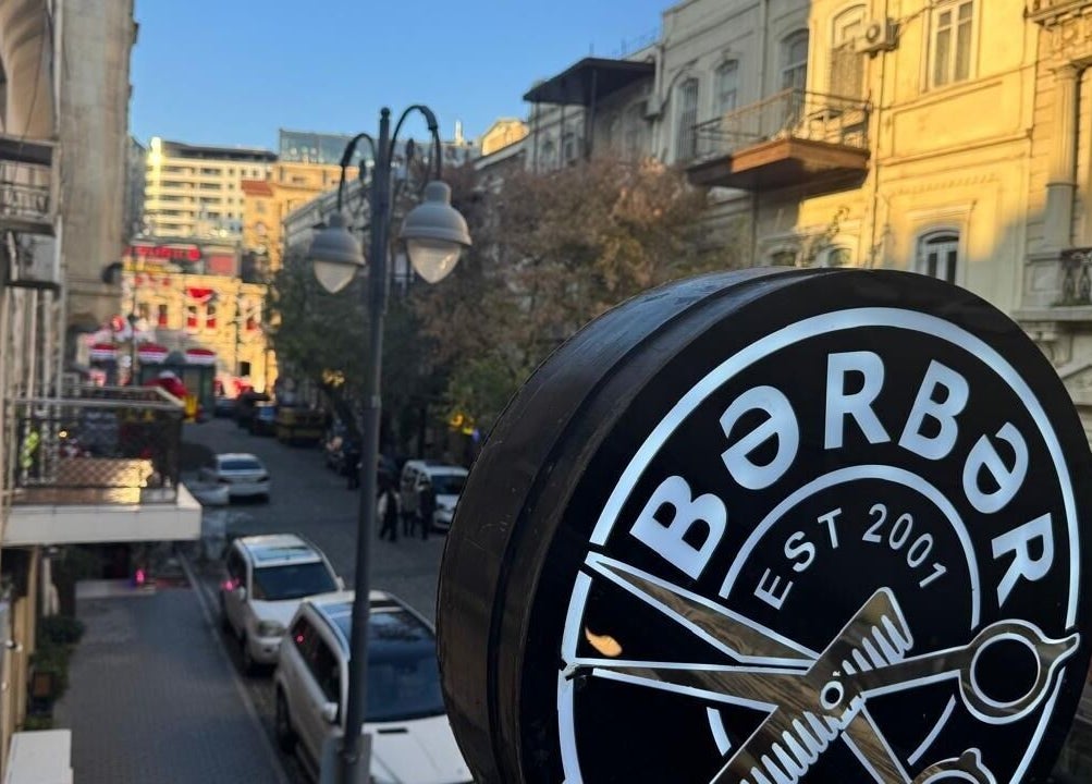 Street view of Barbershop by Z sign in Bakı, AZ showcasing its unique charm.