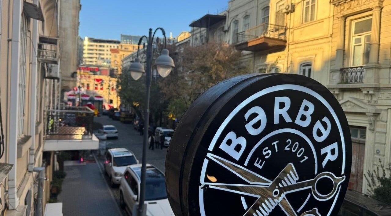 Street view of Barbershop by Z sign in Bakı, AZ showcasing its unique charm.