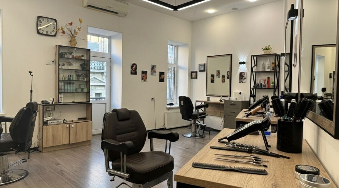 Modern interior of Barbershop by Z, Bakı, AZ with styling stations and tools.