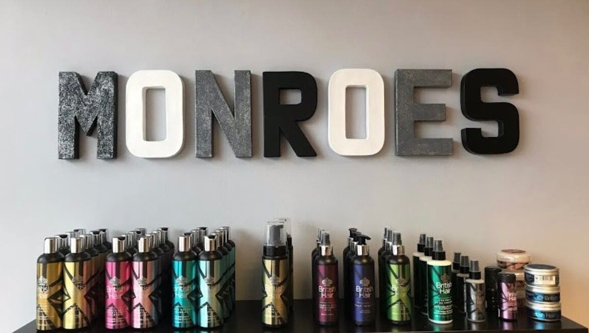 Display of beauty products at Makeupbyparislauren, Bristol, England, GB under 'MONROES' sign.