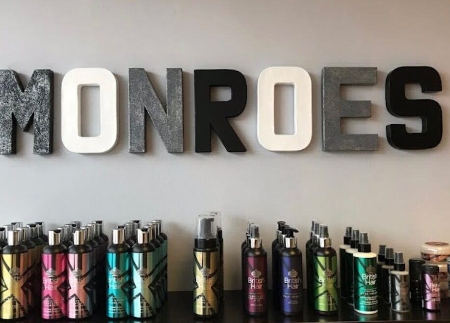 Display of beauty products at Makeupbyparislauren, Bristol, England, GB under 'MONROES' sign.
