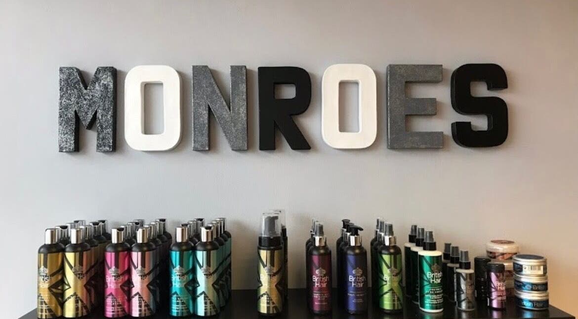 Display of beauty products at Makeupbyparislauren, Bristol, England, GB under 'MONROES' sign.