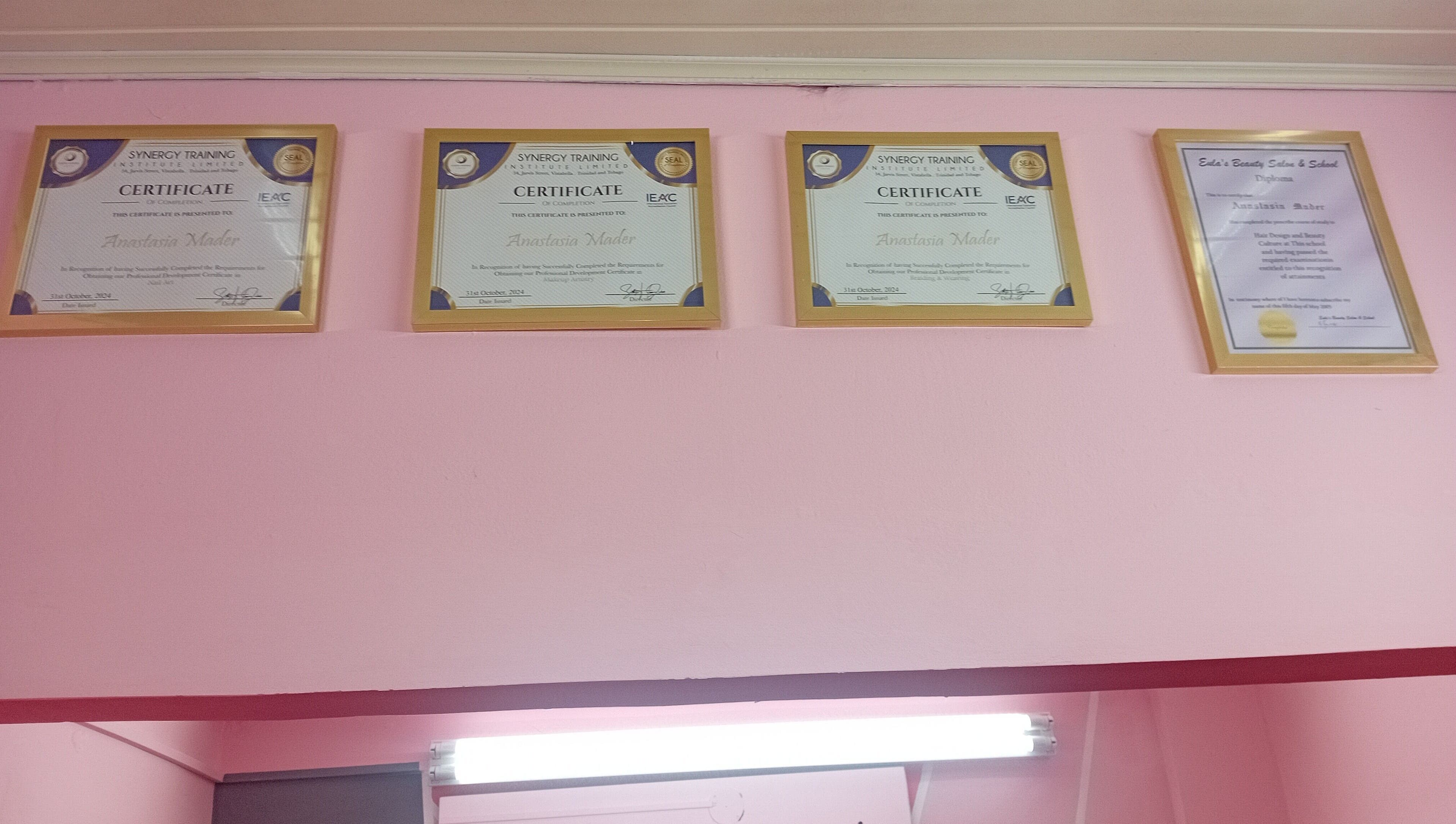 Certificates at Anastasia's Beauty Co™ in Esmeralda, Caroni, TT showcasing professional accolades.
