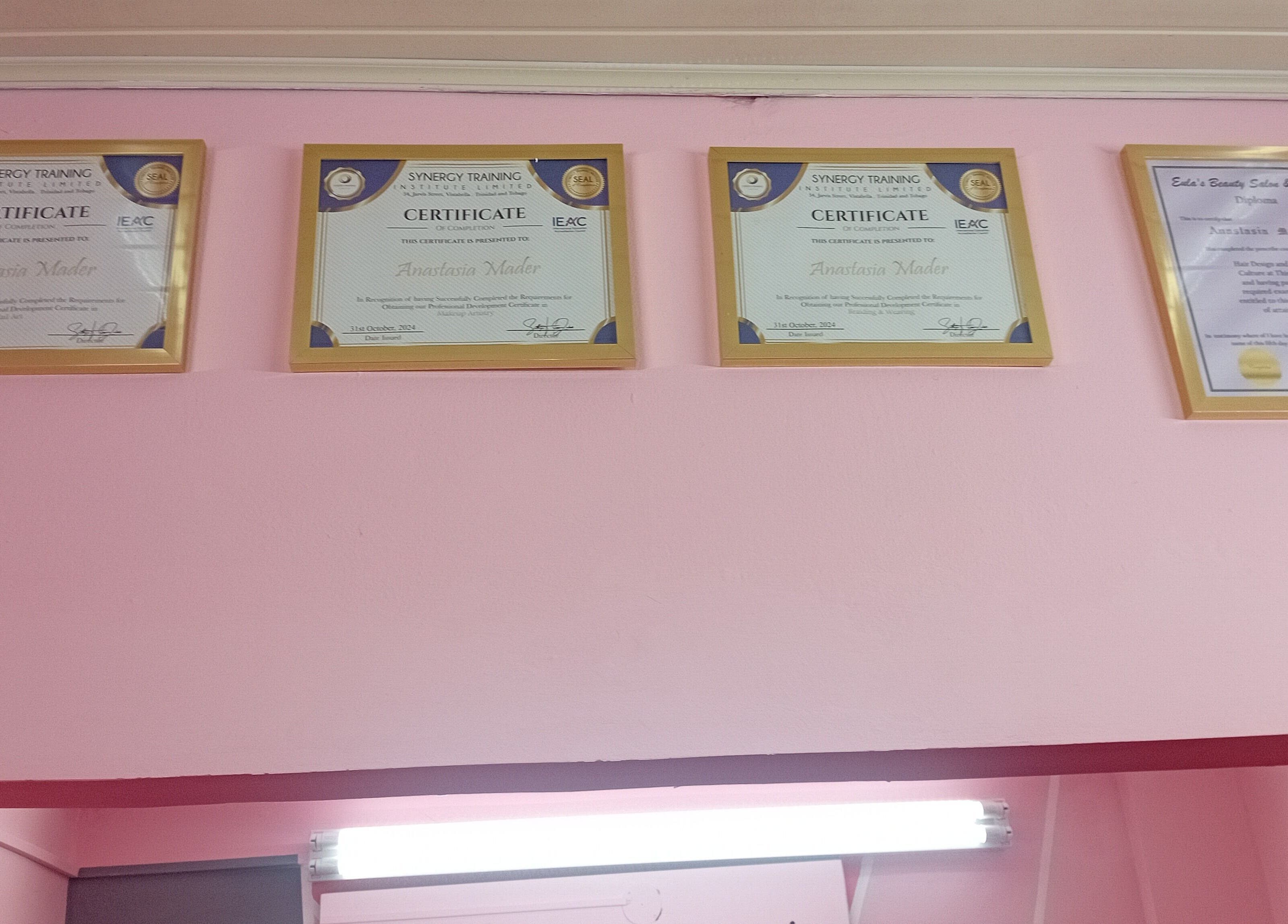 Certificates at Anastasia's Beauty Co™ in Esmeralda, Caroni, TT showcasing professional accolades.