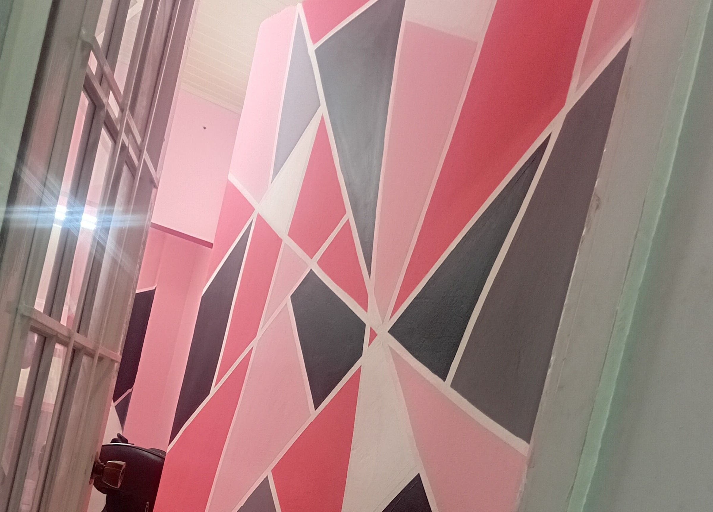 Vibrant geometric wall design at Anastasia's Beauty Co™, Esmeralda, Caroni, TT.