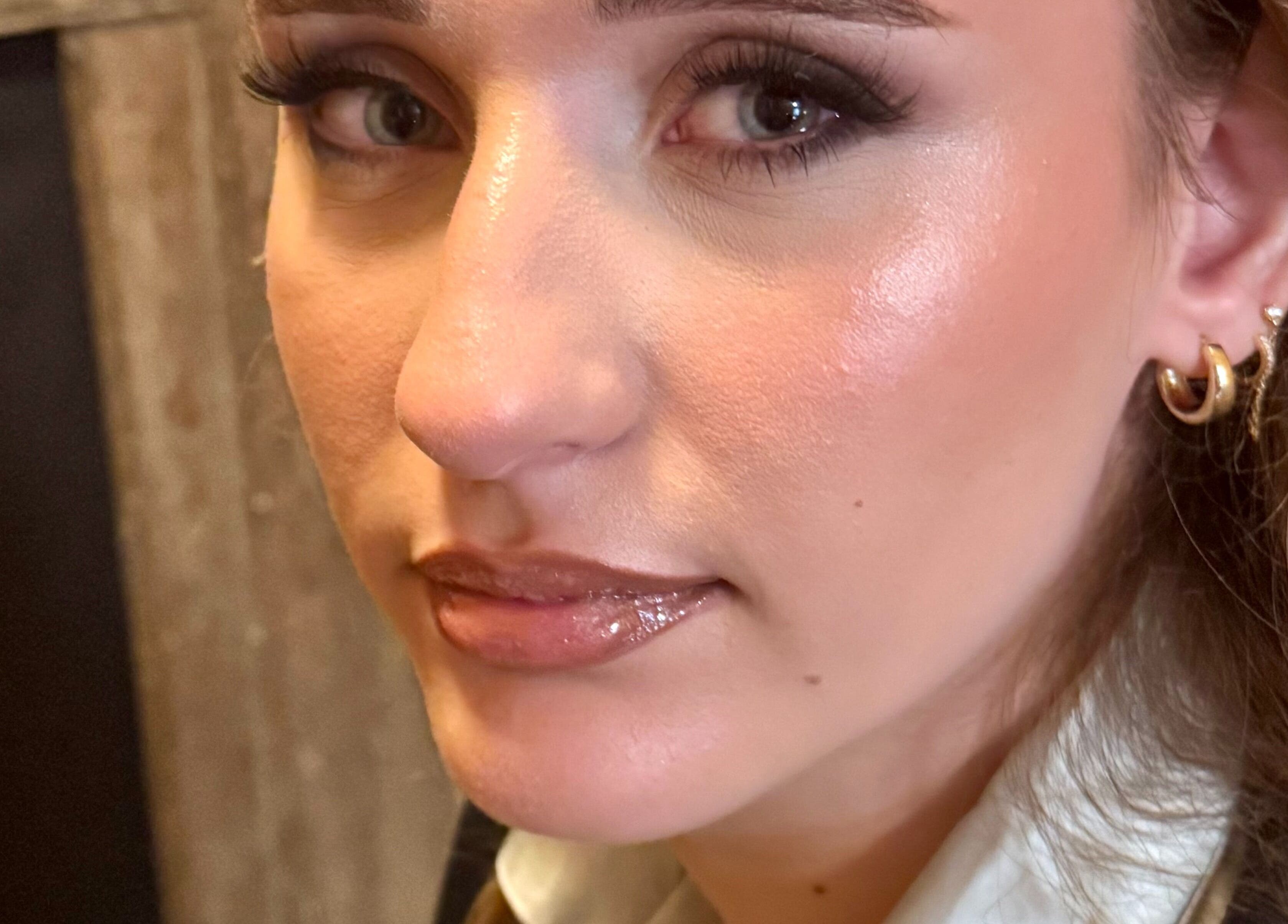 Close-up of glowing skin and makeup by NXO Beauty Co., Houston, Texas, US.