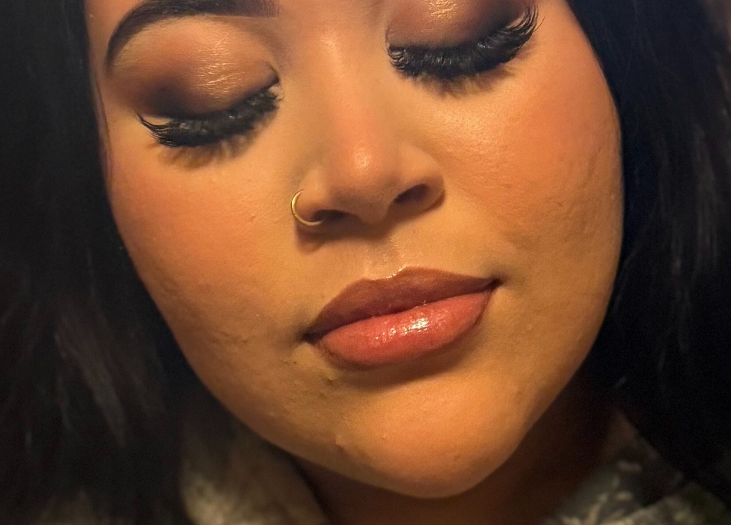 Close-up of elegant makeup at NXO Beauty Co., Houston, Texas, US showcasing smooth skin and subtle eyeshadow.
