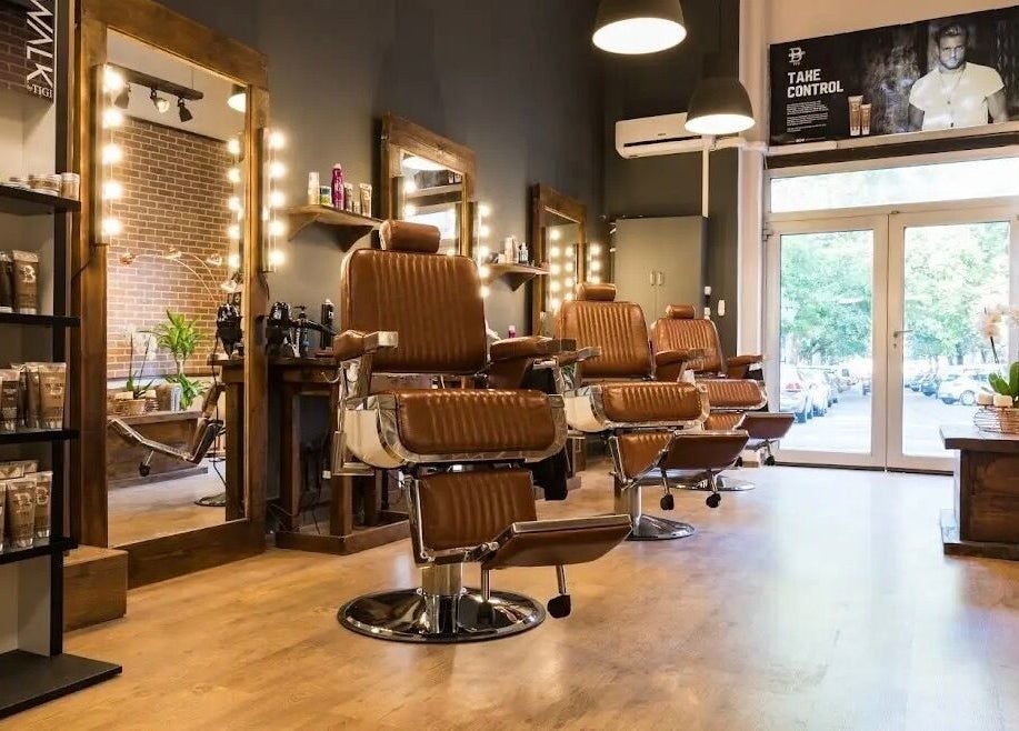 Luxurious salon interior at Cleancut with vintage barber chairs in Budapest, Magyar, HU.