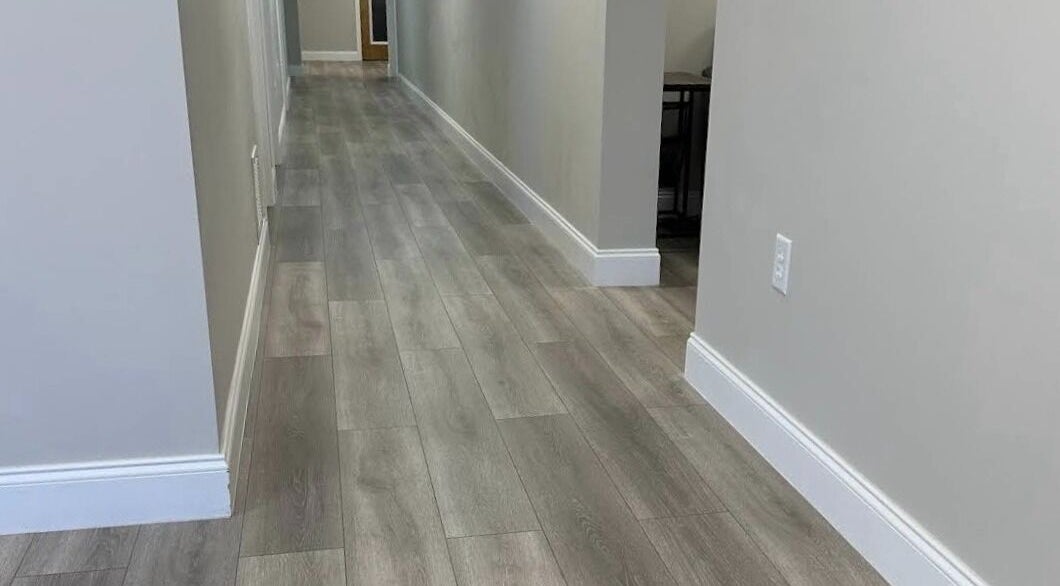 Sleek hallway at Apapacho Studio in Clearwater, Florida, US, featuring modern wood flooring and a serene ambiance.