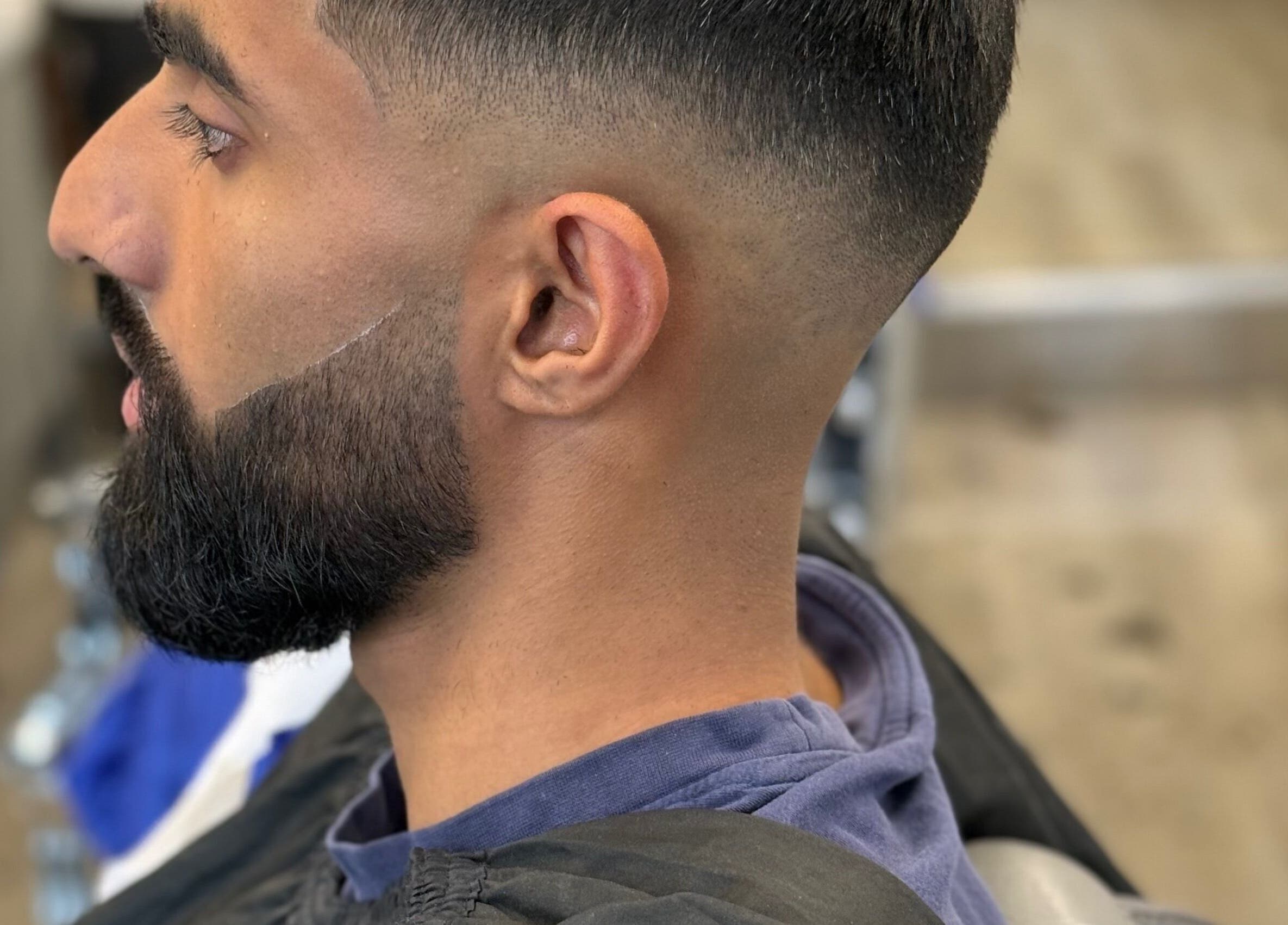 Precision beard trim at Marlos barber high wycombe, High Wycombe, England, GB. Skilled work and sleek style.
