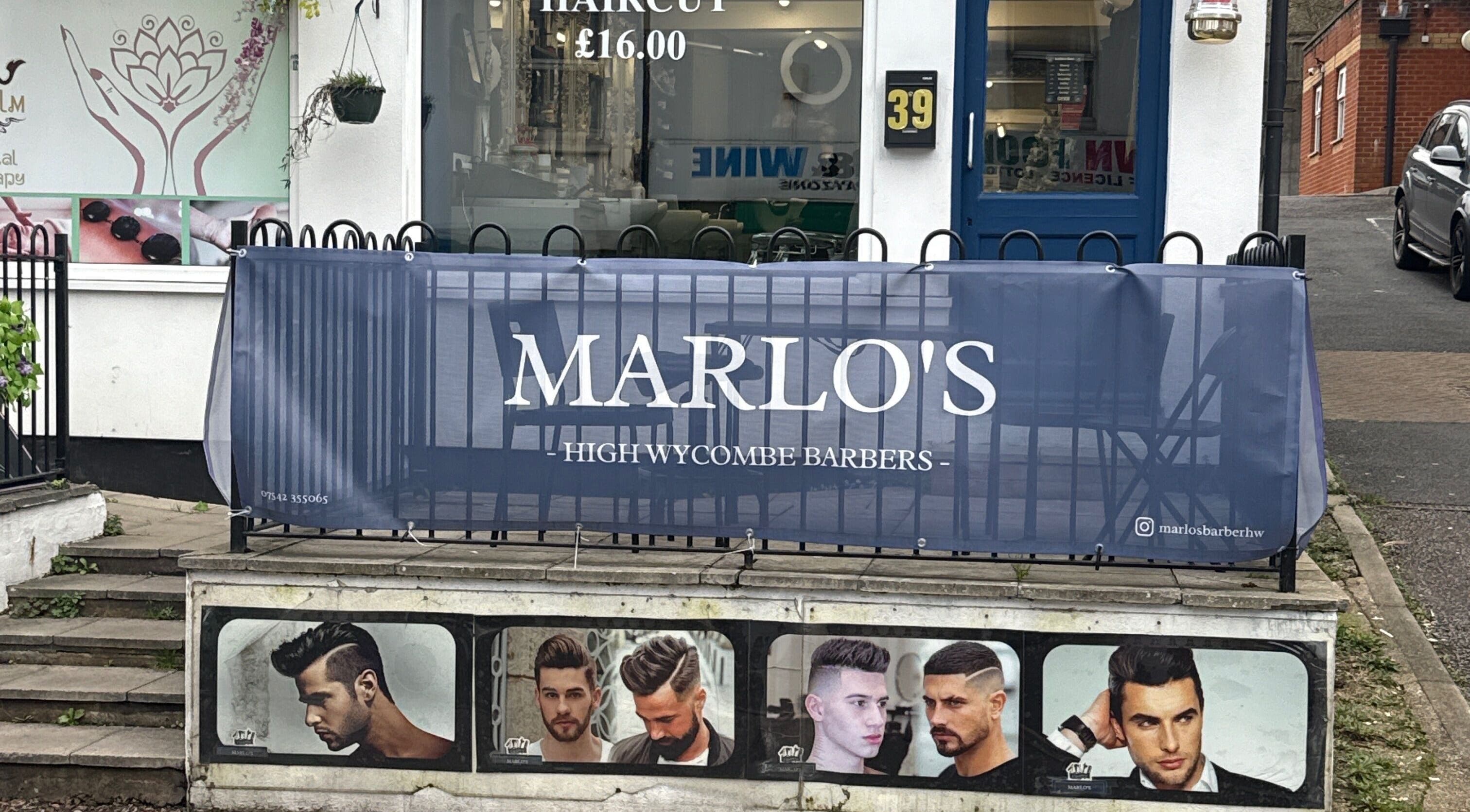 Front view of Marlos Barber High Wycombe, displaying stylish haircuts. Located in High Wycombe, England, GB.