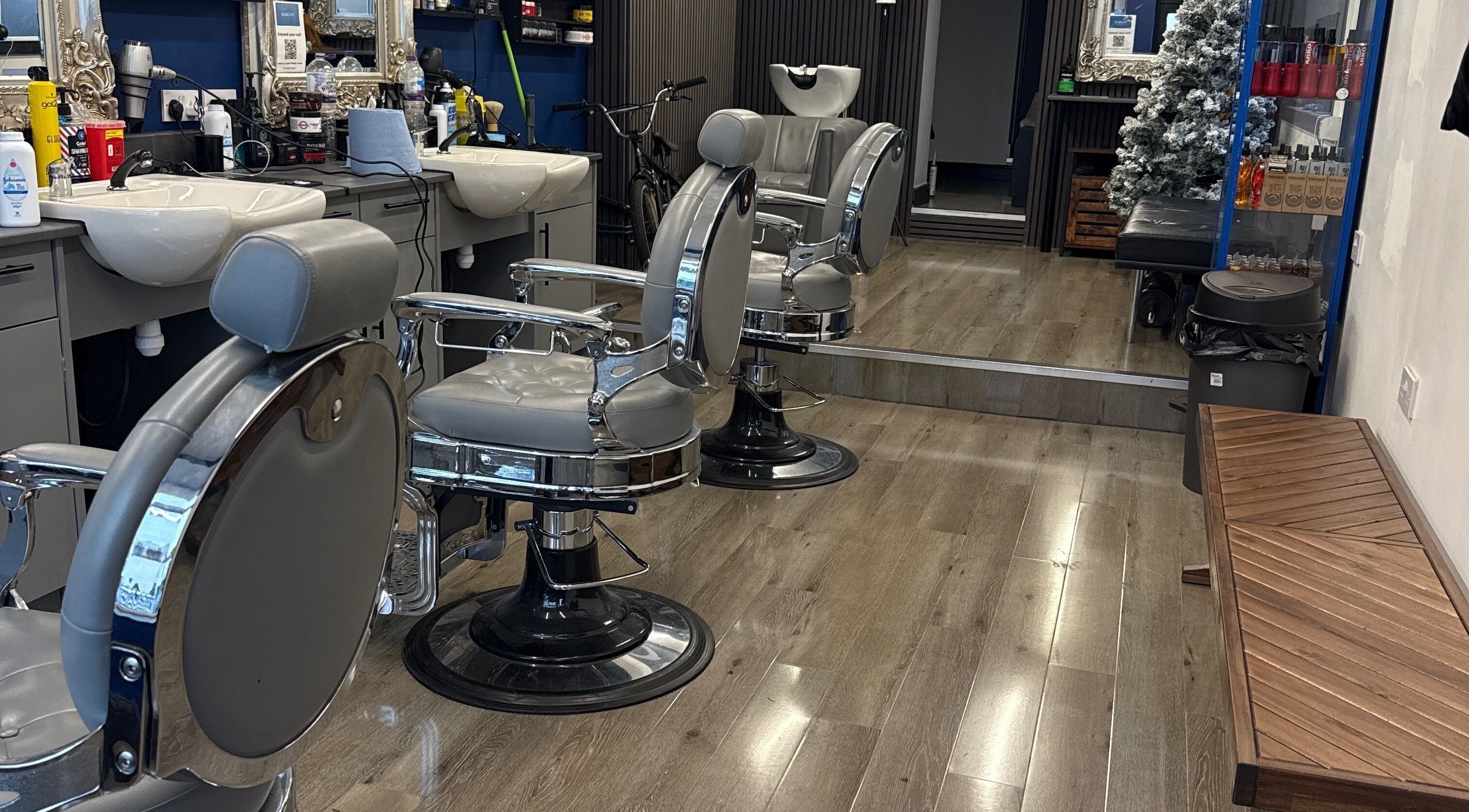Interior of Marlos Barber High Wycombe showcasing stylish chairs and decor in High Wycombe, England, GB.