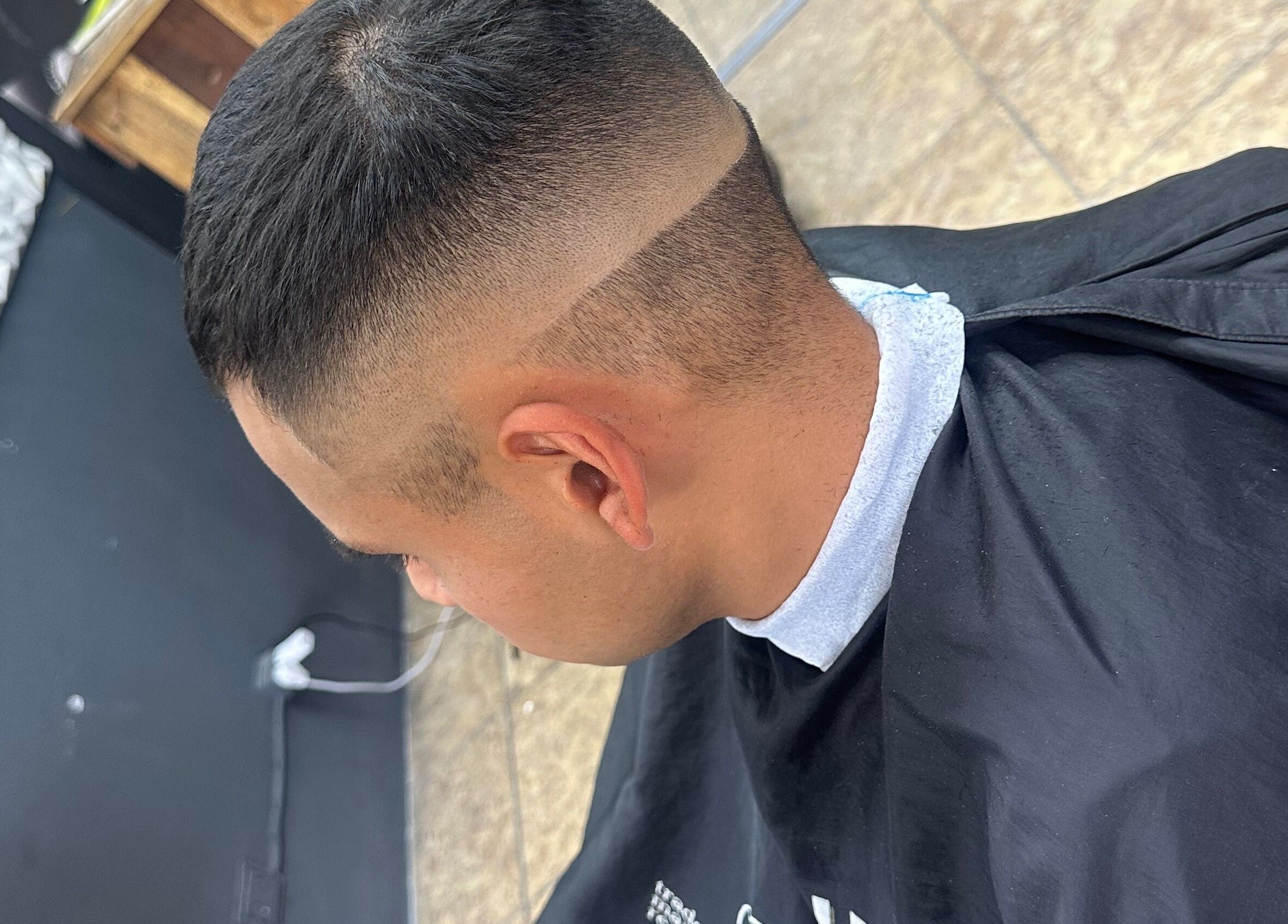 Sleek fade haircut at BussinesAccount in Buenos Aires, Ciudad Autónoma De Buenos Aires, AR.