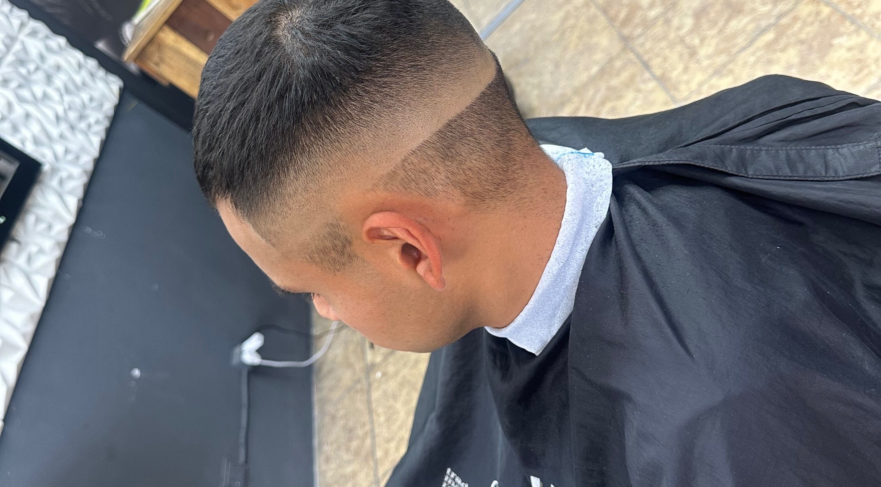 Sleek fade haircut at BussinesAccount in Buenos Aires, Ciudad Autónoma De Buenos Aires, AR.