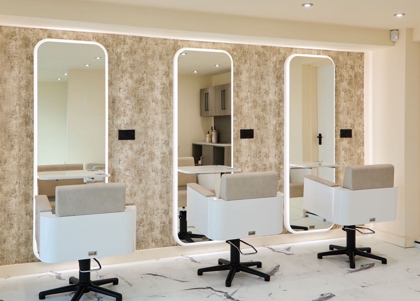 Modern salon chairs and mirrors at S.Rose By Linda, Ramsbottom, England, GB.