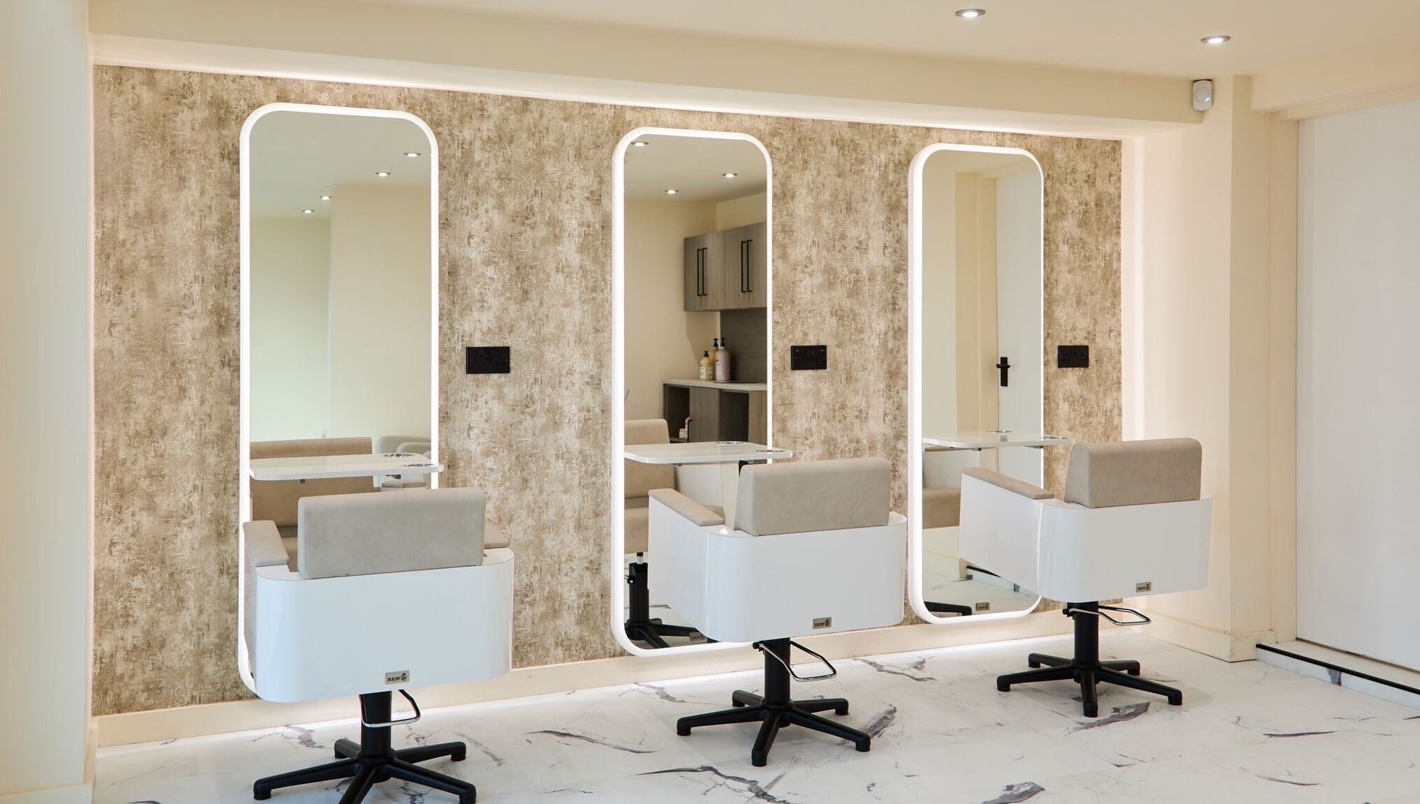 Modern salon chairs and mirrors at S.Rose By Linda, Ramsbottom, England, GB, perfect for beauty treatments.