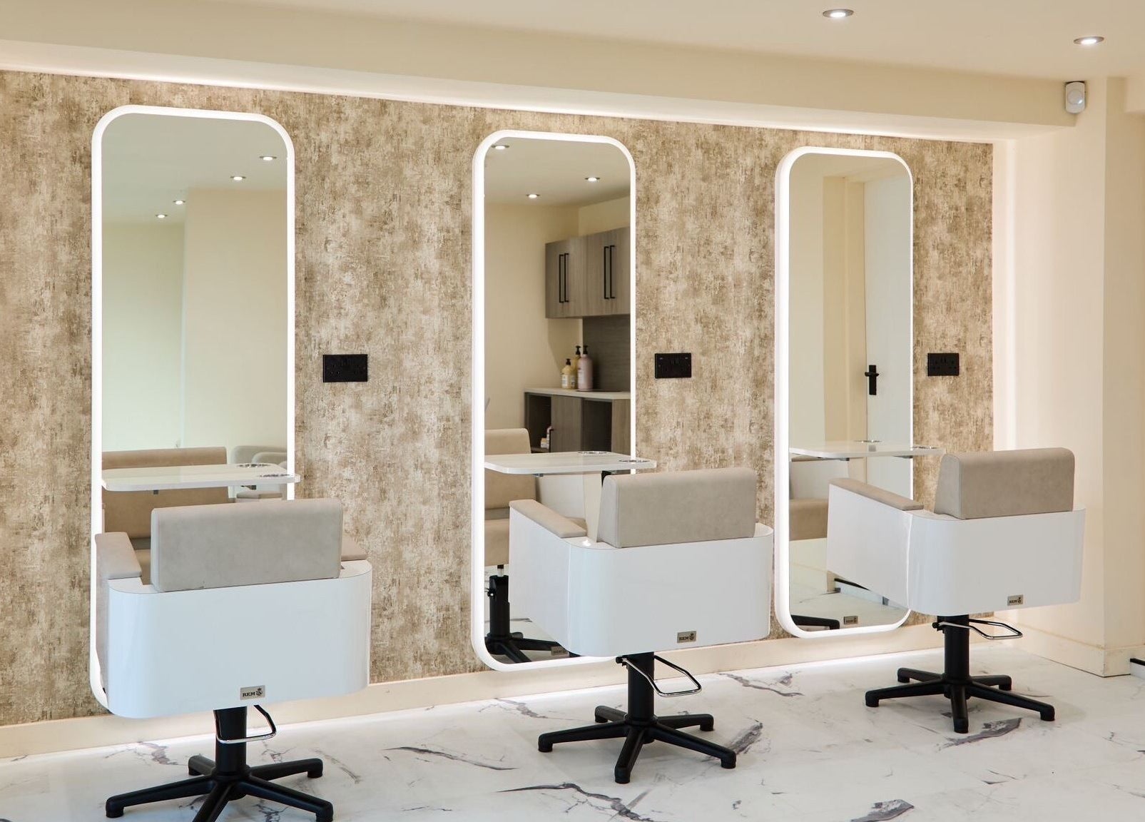 Modern salon chairs and mirrors at S.Rose By Linda, Ramsbottom, England, GB, perfect for beauty treatments.