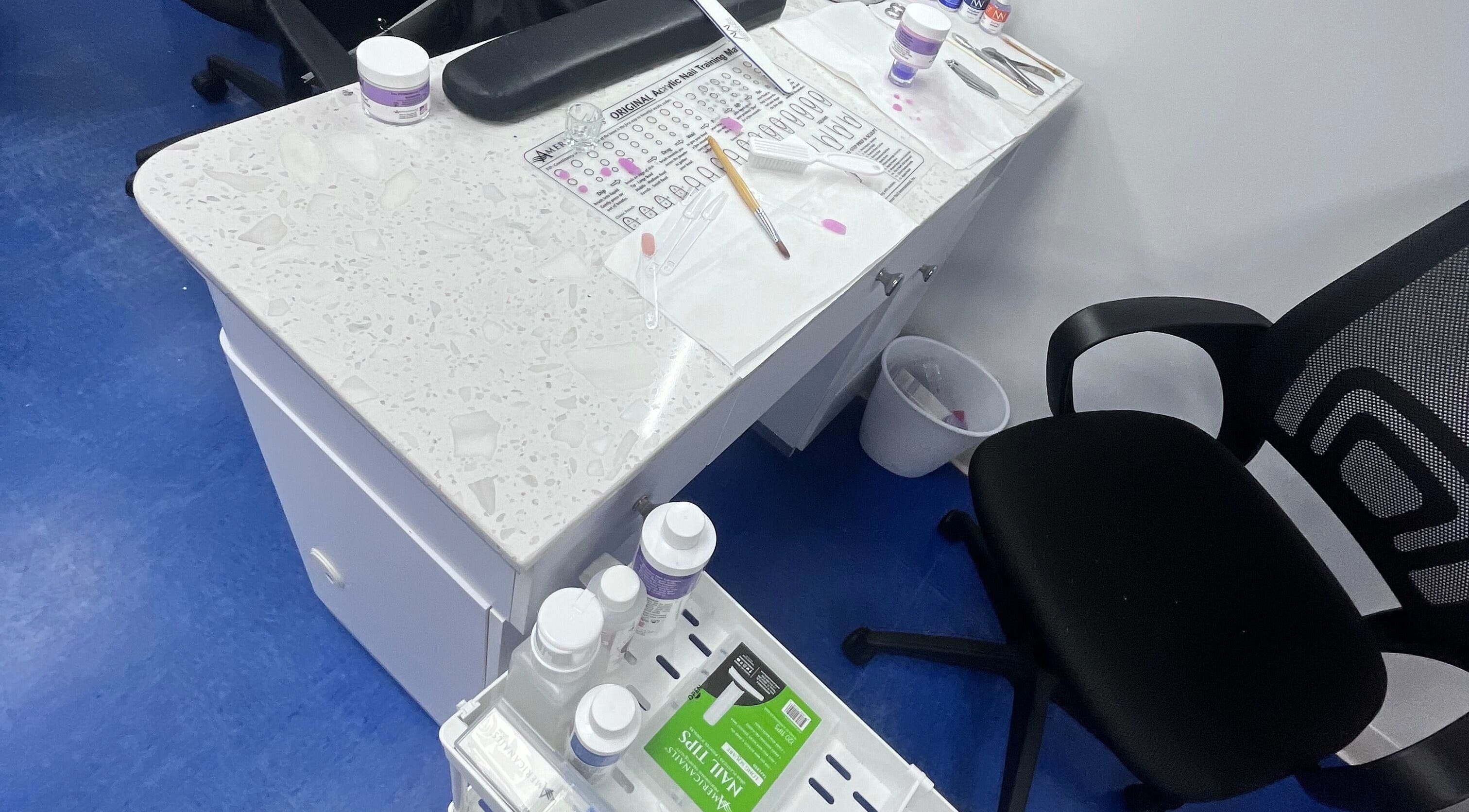 NailsoDivine nail station set up with tools in Orlando, Florida, US, showcasing clean design and professional setup.