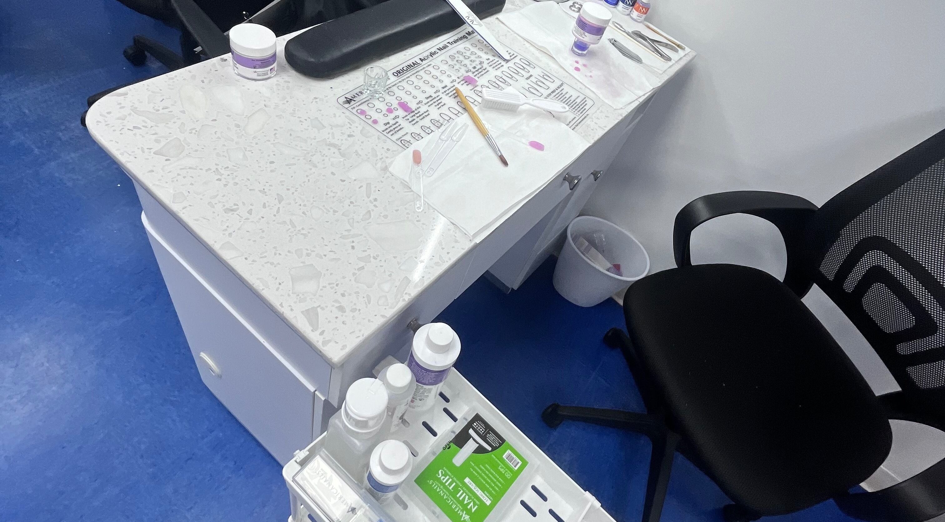 NailsoDivine nail station set up with tools in Orlando, Florida, US, showcasing clean design and professional setup.