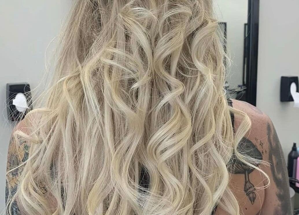 Elegant blonde curls styled at Hair_By_Taej, Abbotsford, British Columbia, CA. Perfect for any occasion.