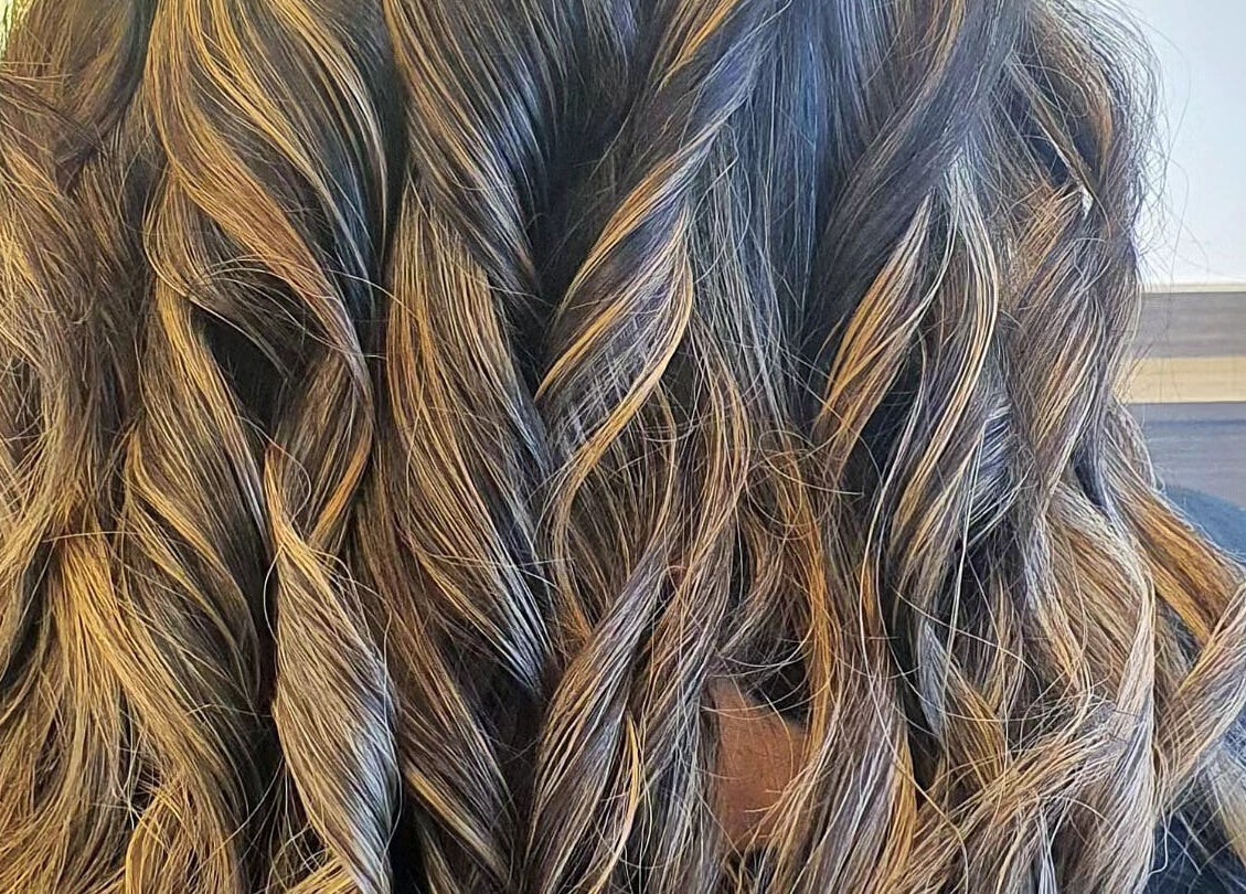 Stylish curled hair at Haus of Shades, Doncaster, Victoria, AU showcasing expertise in modern hair styling.