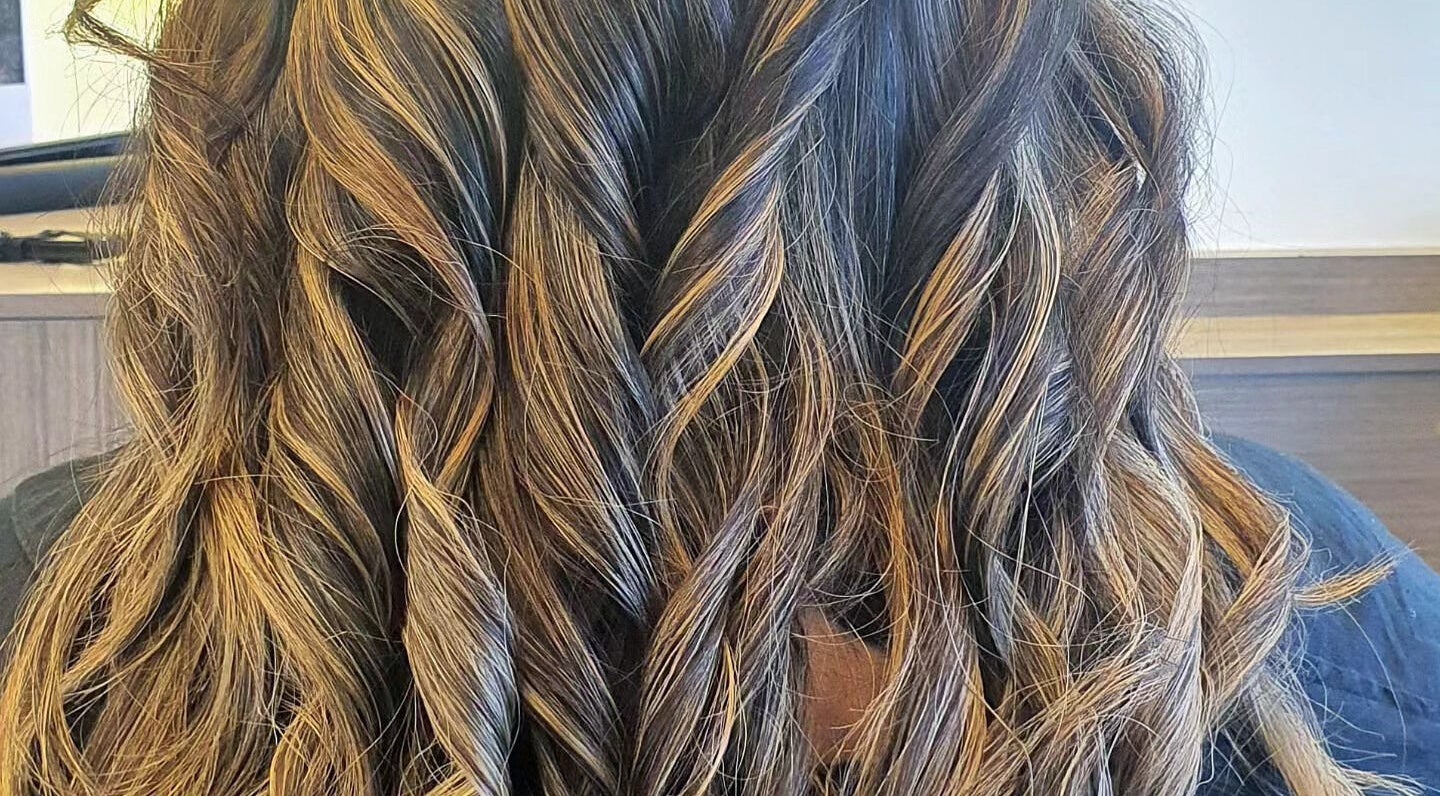 Stylish curled hair at Haus of Shades, Doncaster, Victoria, AU showcasing expertise in modern hair styling.